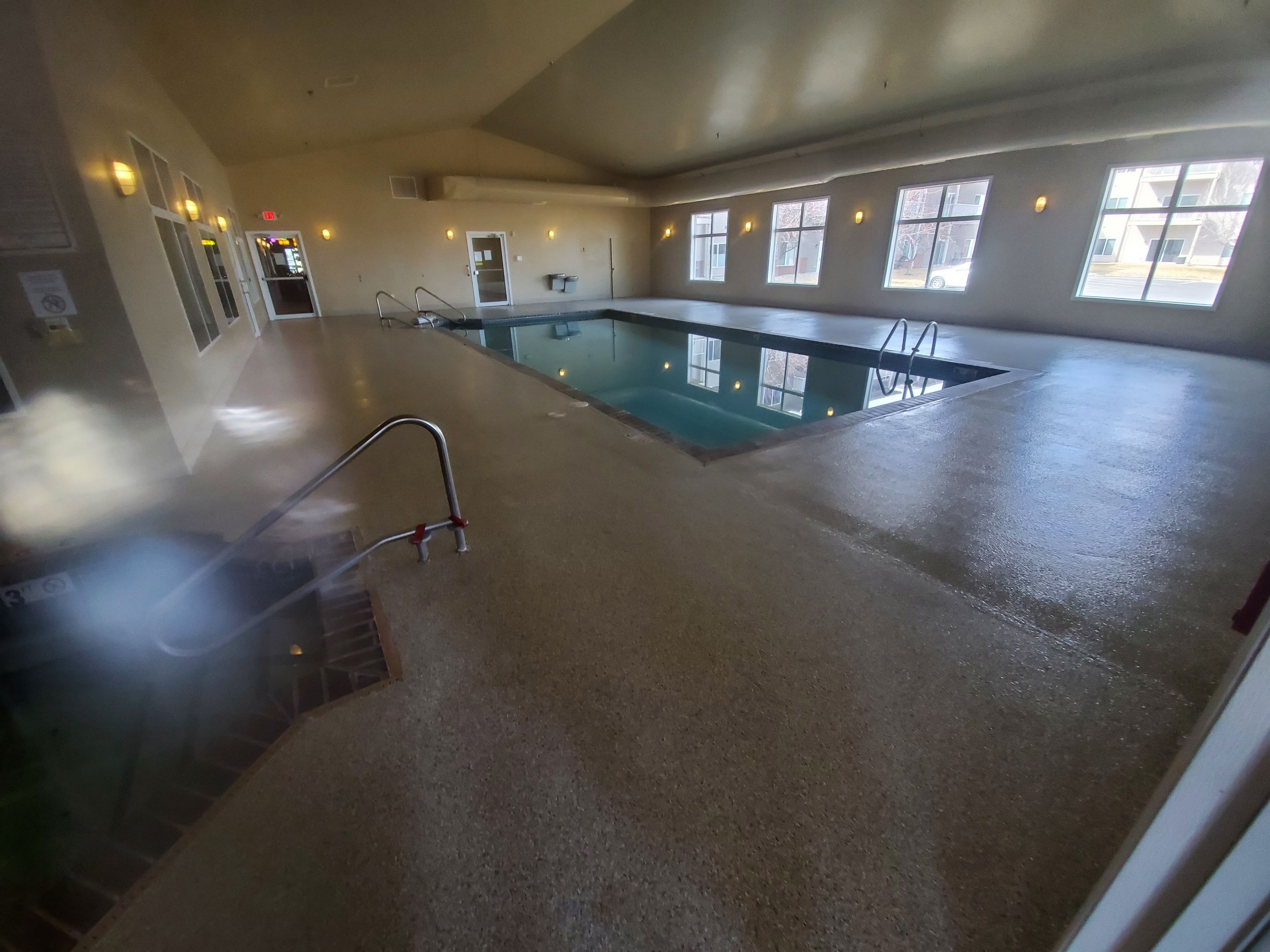 Pool Deck using Mount Everest by Select Painting, Coatings & Garage Cabinets