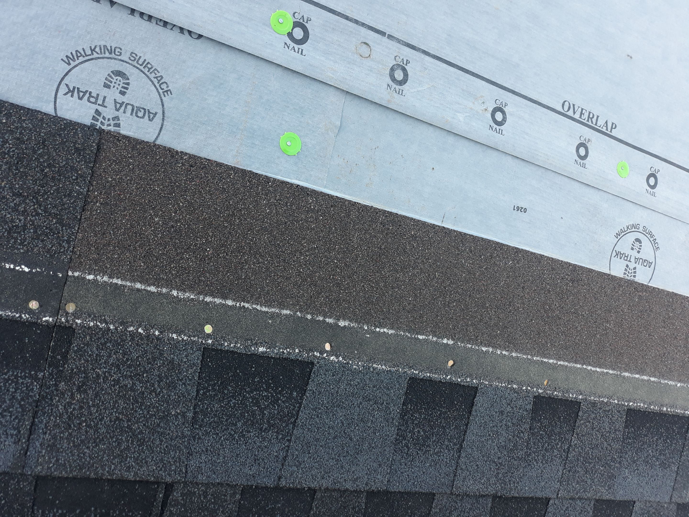 Residential Roofing Installation using Roof Replacement by American Roofing & Construction LLC