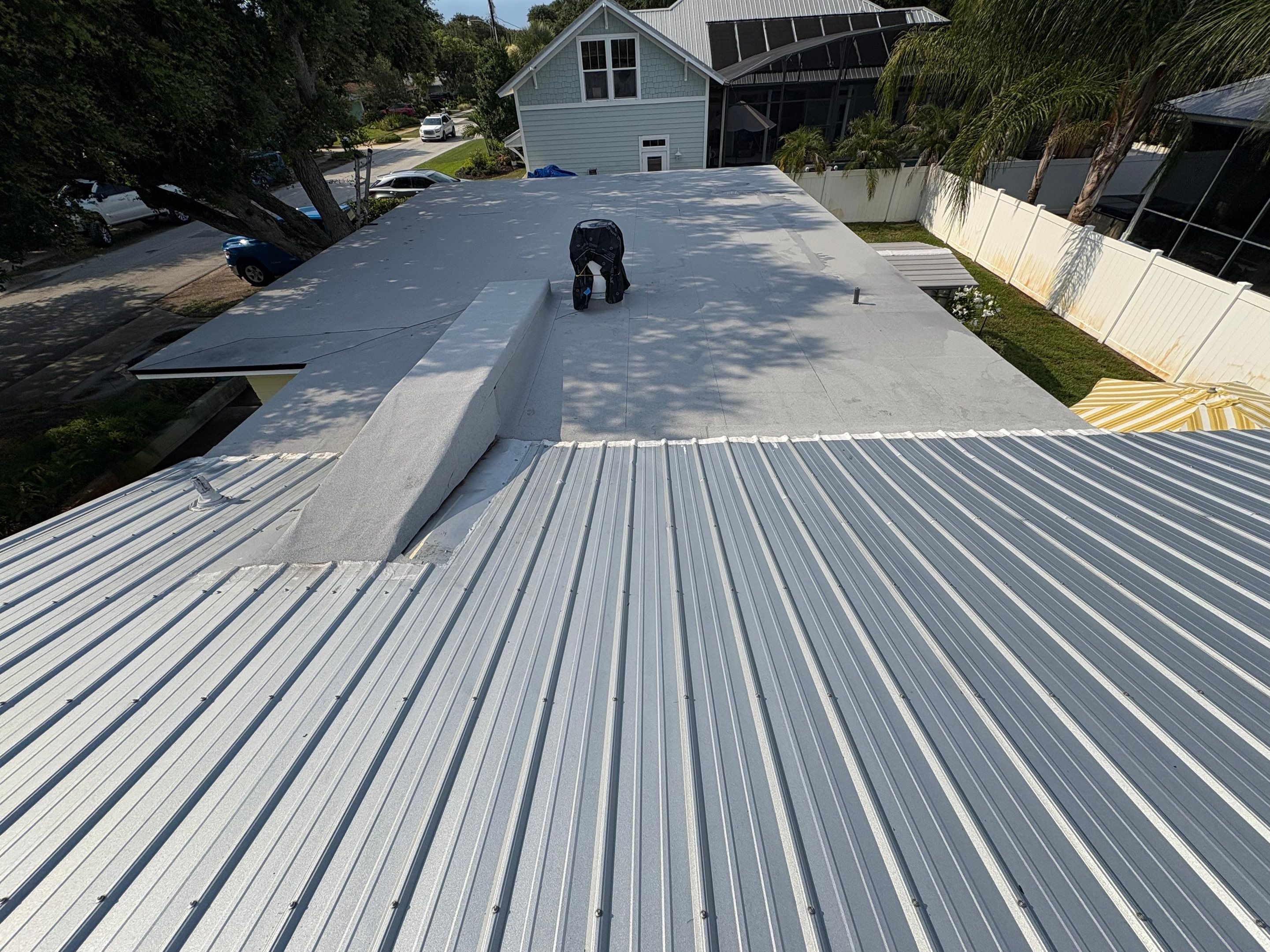 Flat Reroof Replacement New Smyrna Beach FL by Pinnacle Roofing Group