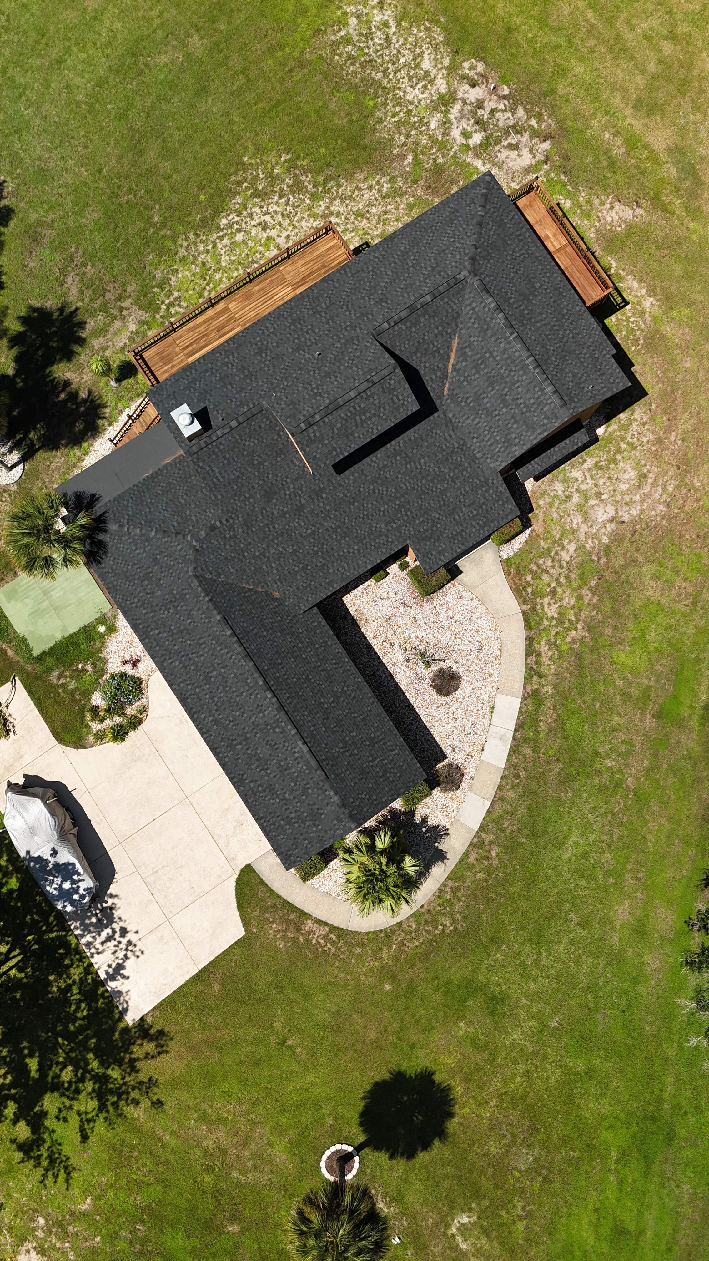 Roof Replacement in Merritt Island Featuring Tamko Titan Rustic Black Shingles by Wiedmann Construction & Roofing