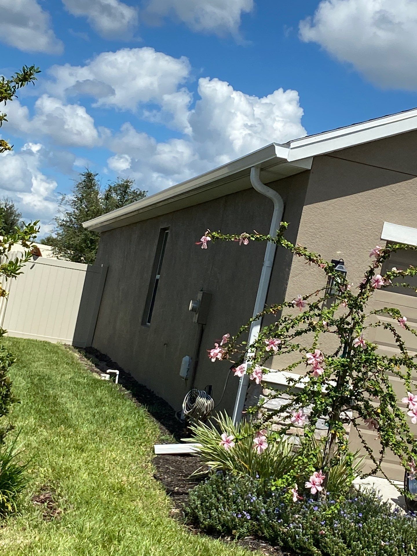 Gutter System with Downspouts in Bradenton FL by Gutter Professors