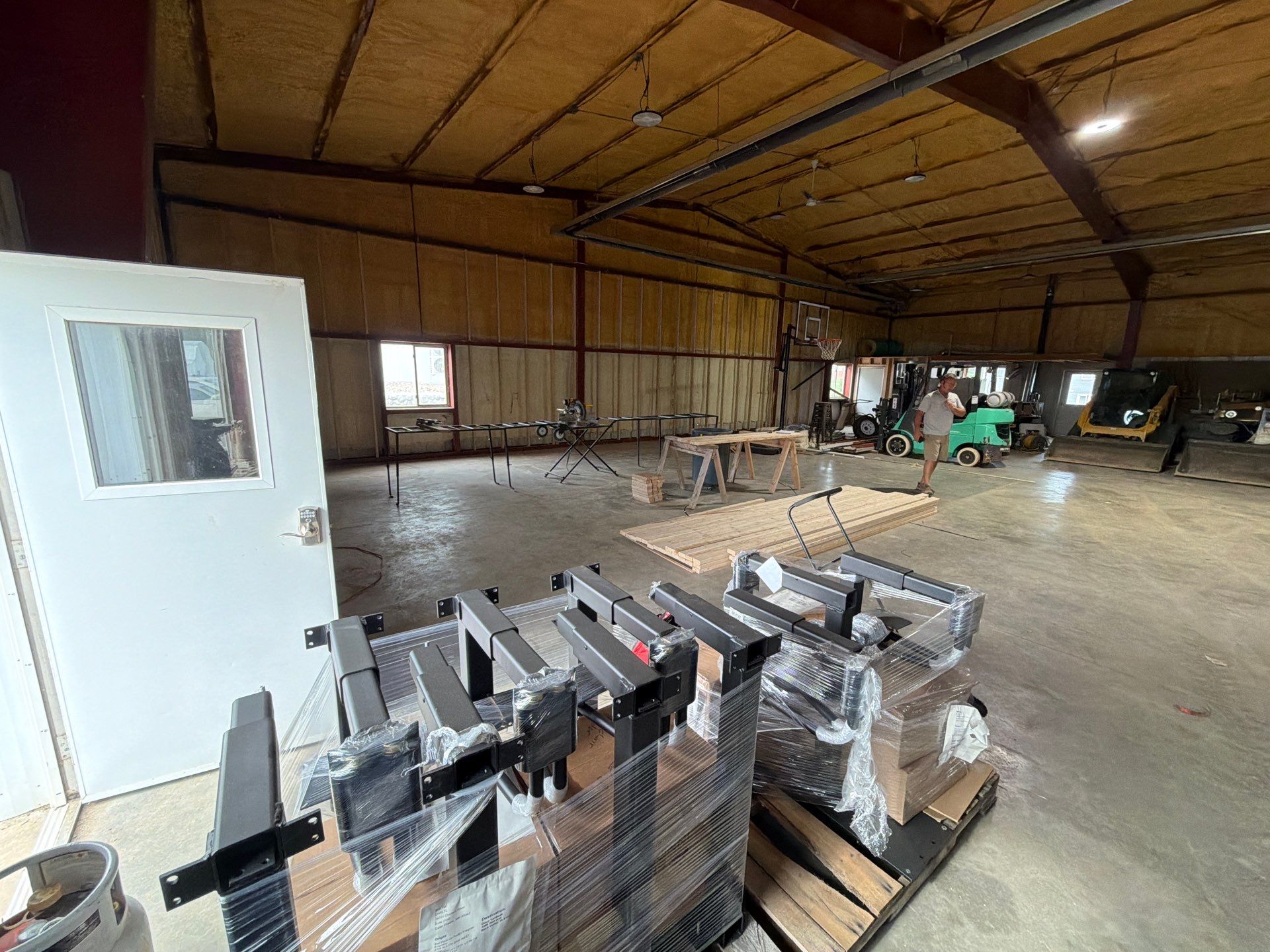 Custom Polyurea Shop Floor with Basketball Court Lines in Rock Valley by Select Painting, Coatings & Garage Cabinets