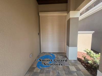 Motorized Rolling Shutters in Beige 