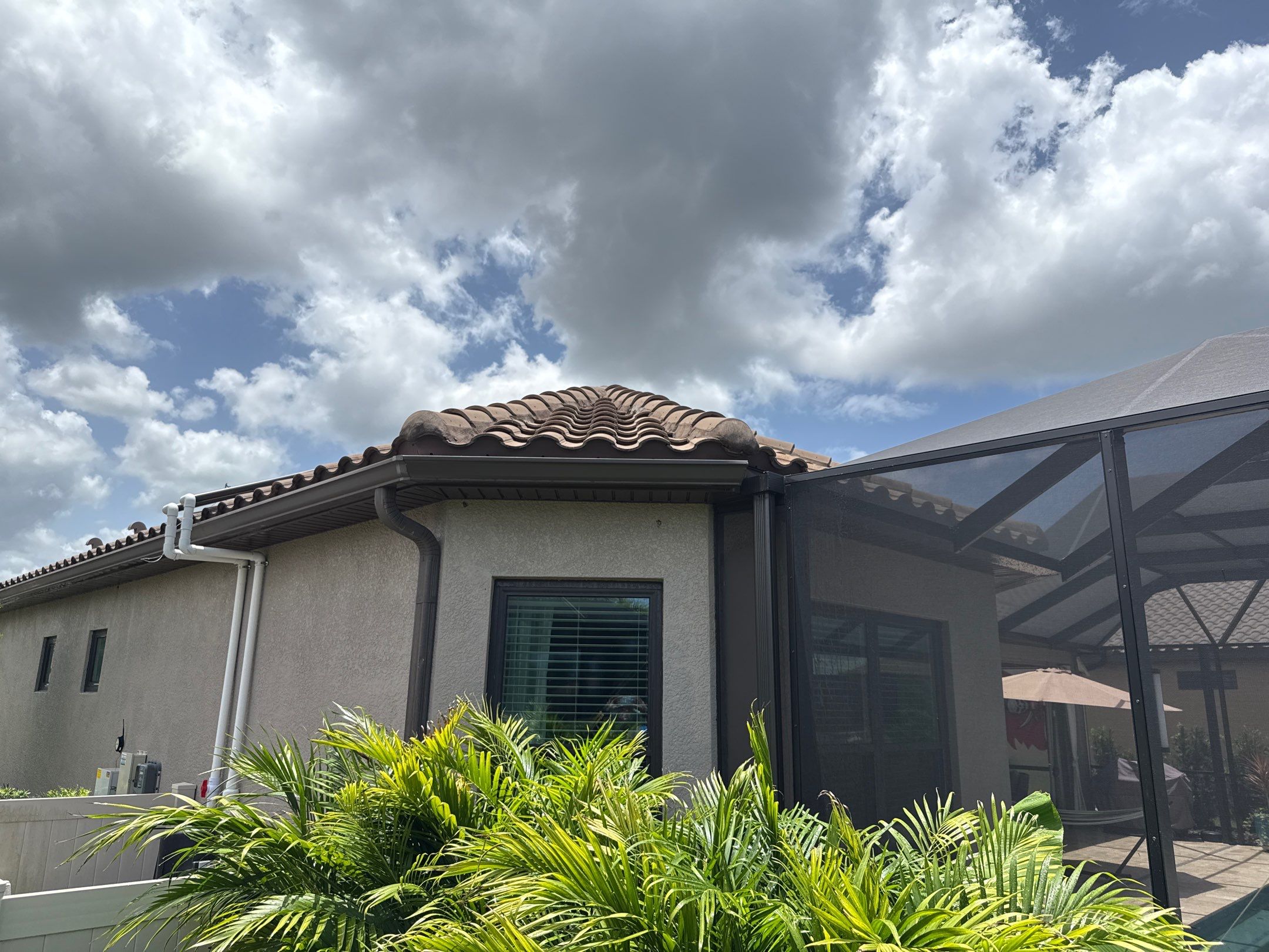 Neighboring Tile Roof Cleaning with Gutter Runoff Control – Palmetto, FL by Sunshine AquaWash
