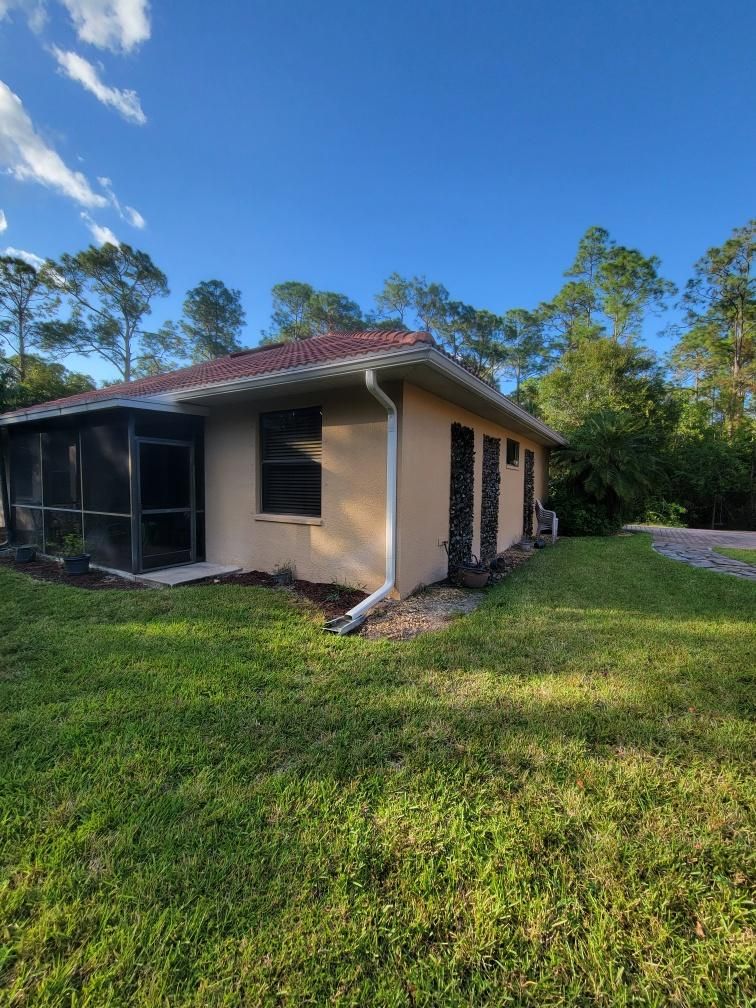 New Splash Guards and 6-Inch seamless Gutters in Naples FL by Gutter Professors