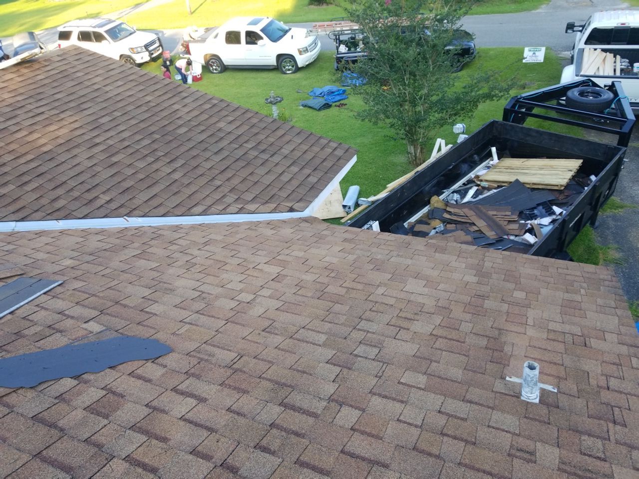 Residential Roofing Installation using Roof Replacement by American Roofing & Construction LLC