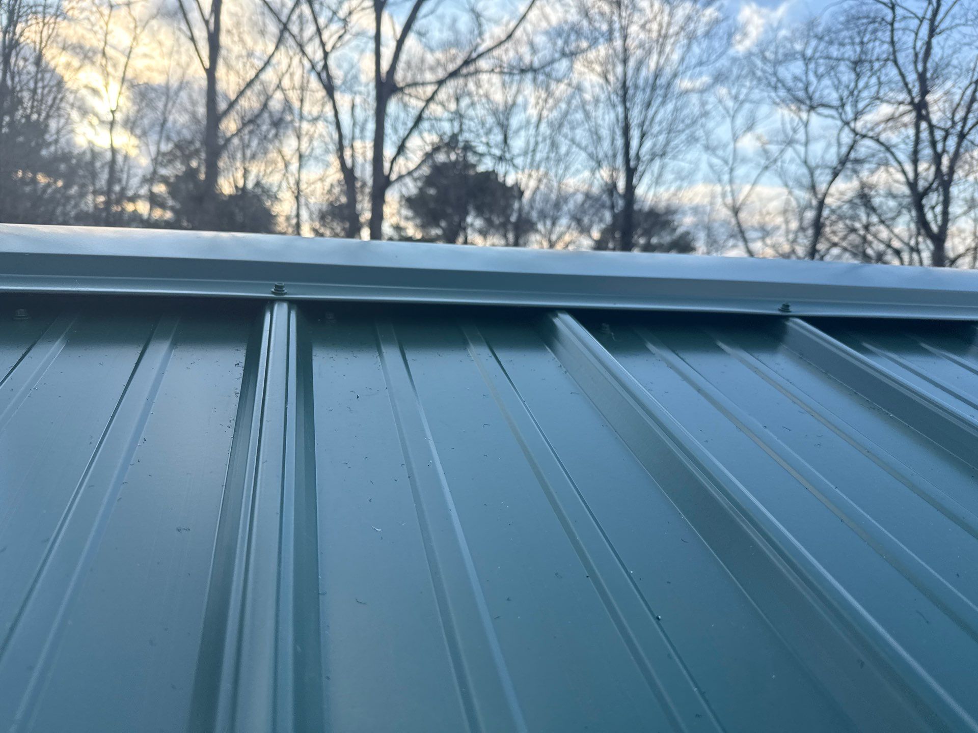 Metal Roof and Gutters Replacement in Hueytown by The Roofing Dudes