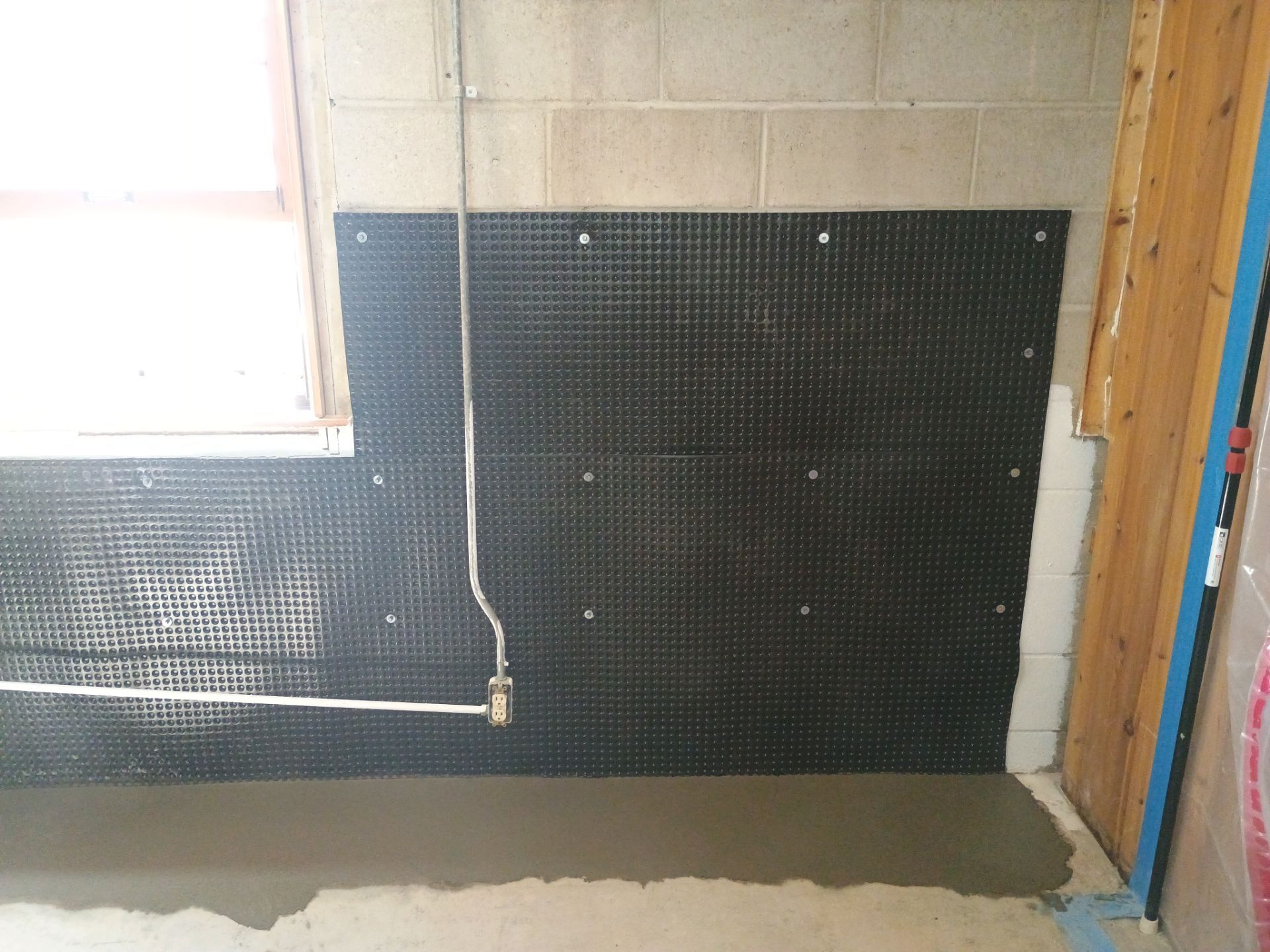 Interior Drain Tile & Foundation Crack Repair in St. Anthony, MN by Waterproofing Northeast