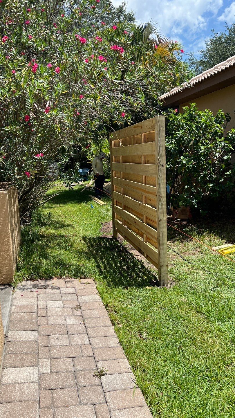 Osprey, FL 6ft. Tall Treated Horizontal Shadowbox Wood Fence by Asap fence and gates, LLC