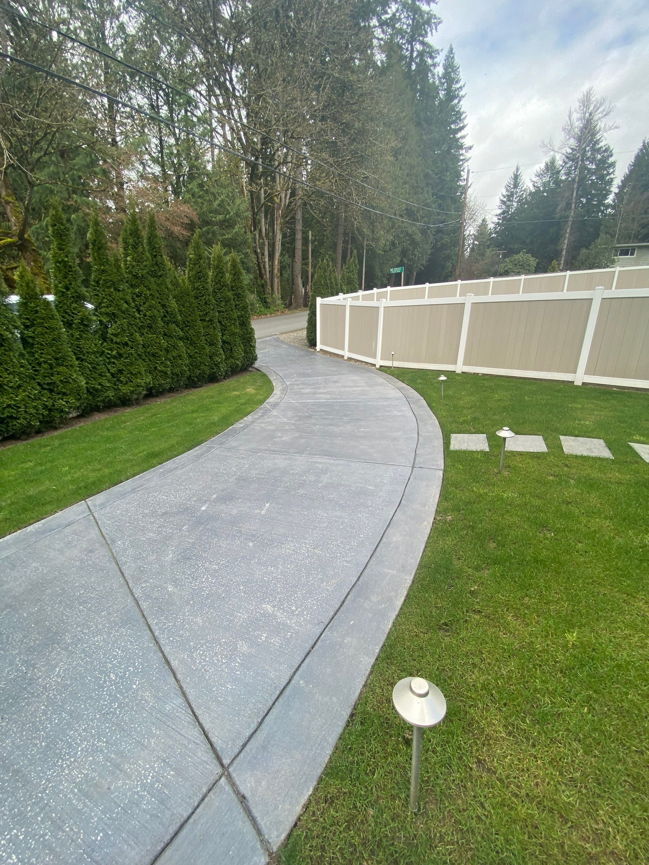 Melanie | Concrete Driveway  by Jireh Asphalt & Concrete Inc 