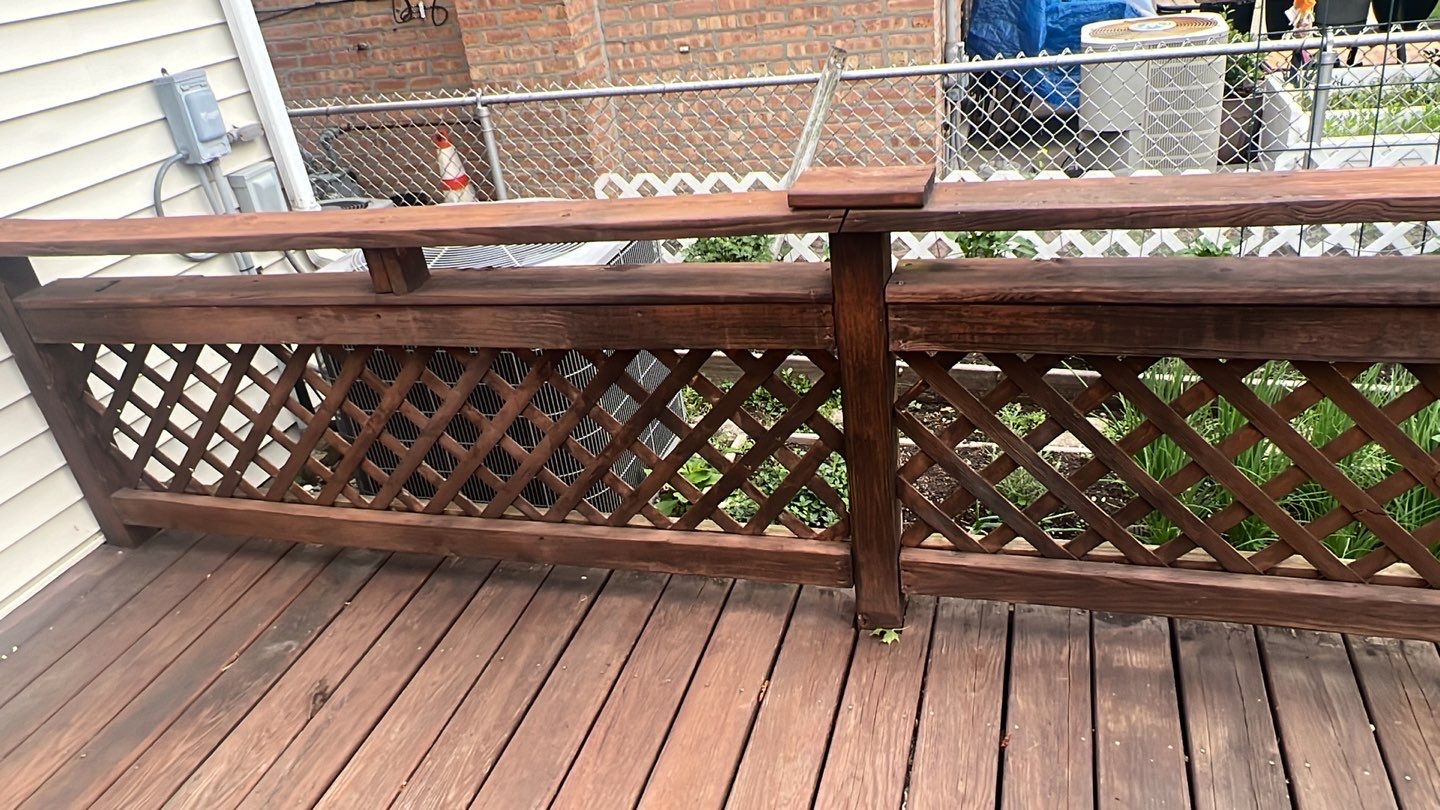 Wood cleaning and staining using Armstrong cloark oil stain by Northern Power Washing LLC.