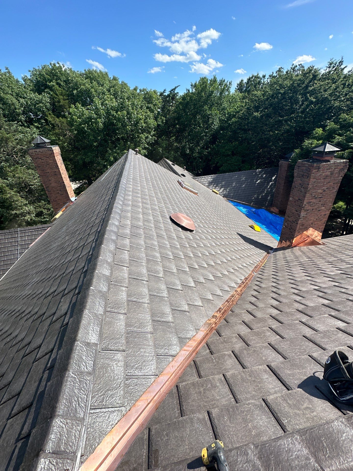 Residential Roofing Installation Using Enviroshake Synthetic Slate by Undersun Roofing 