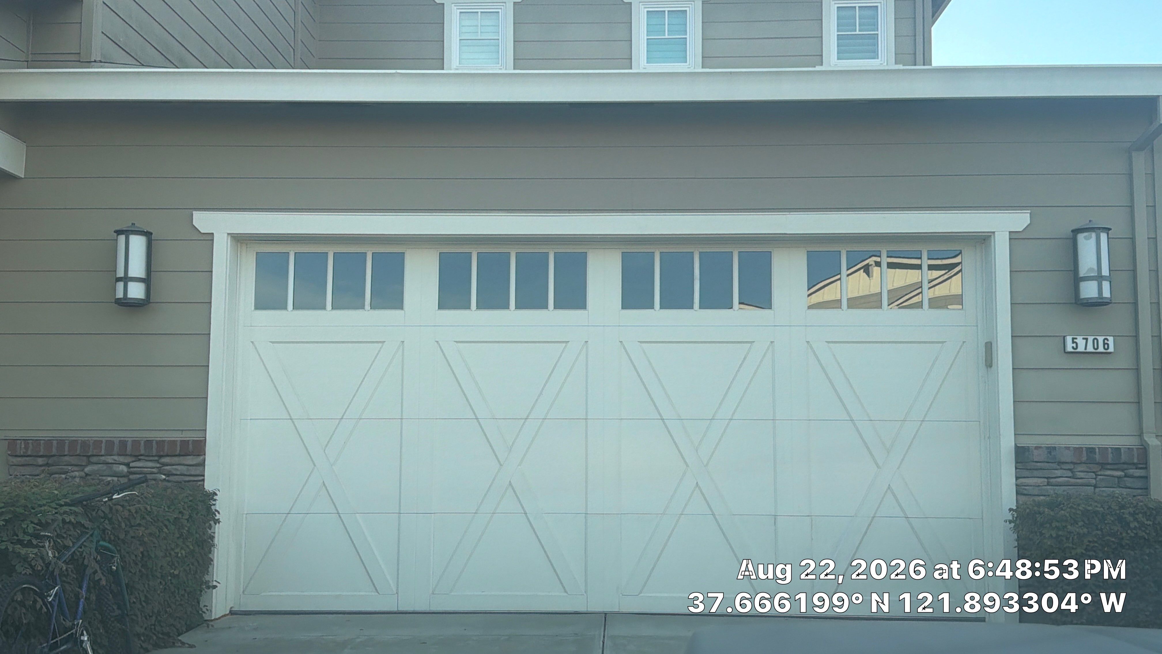 White Carriage-Style Garage Door Installation with Decorative Windows in Pleasanton by Valiant Garage Door
