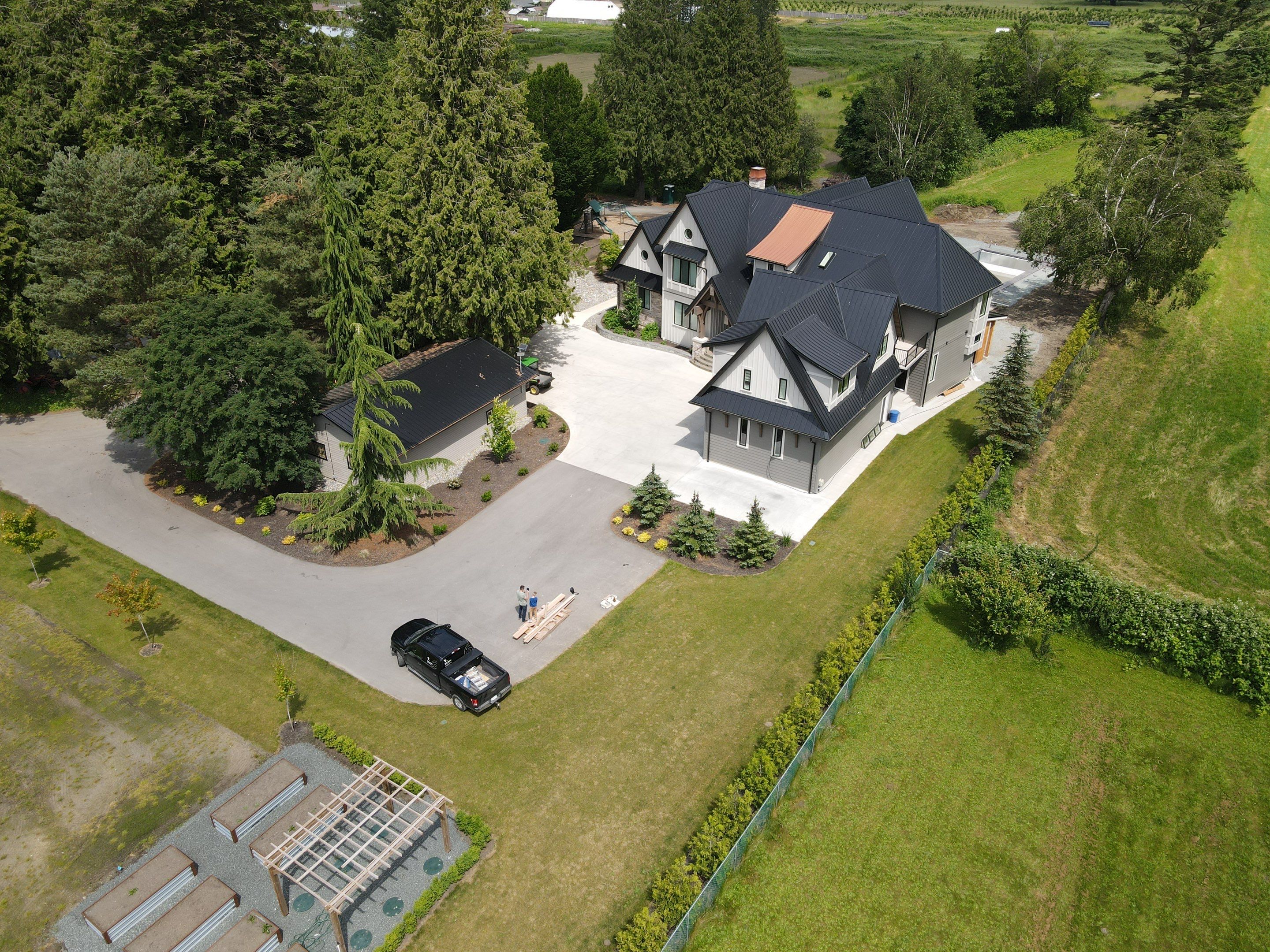 Commercial Roofing Installation using 12" Prolok metal  by Top Notch Roofing Inc