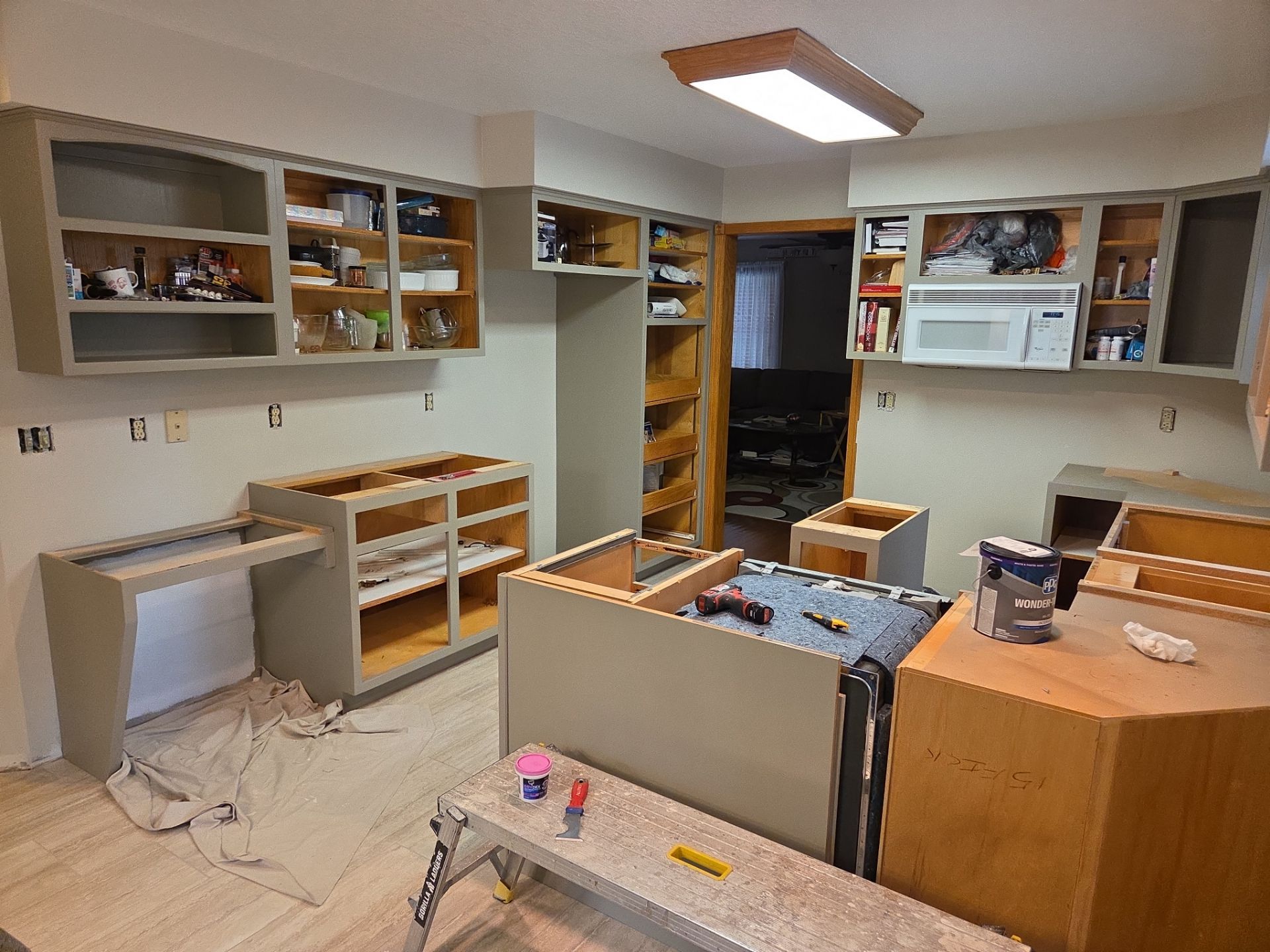 Kitchen Cabinet Painting and Hardware Update in Sioux Falls by Select Painting, Coatings & Garage Cabinets