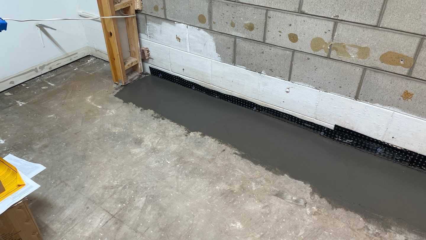 Interior Drain Tile & Sump System in St. Paul, MN by Waterproofing Northeast