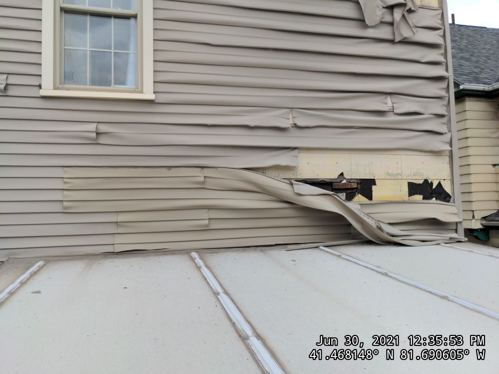 Fire damaged home in Tremont by Absolute Roofing and Construction