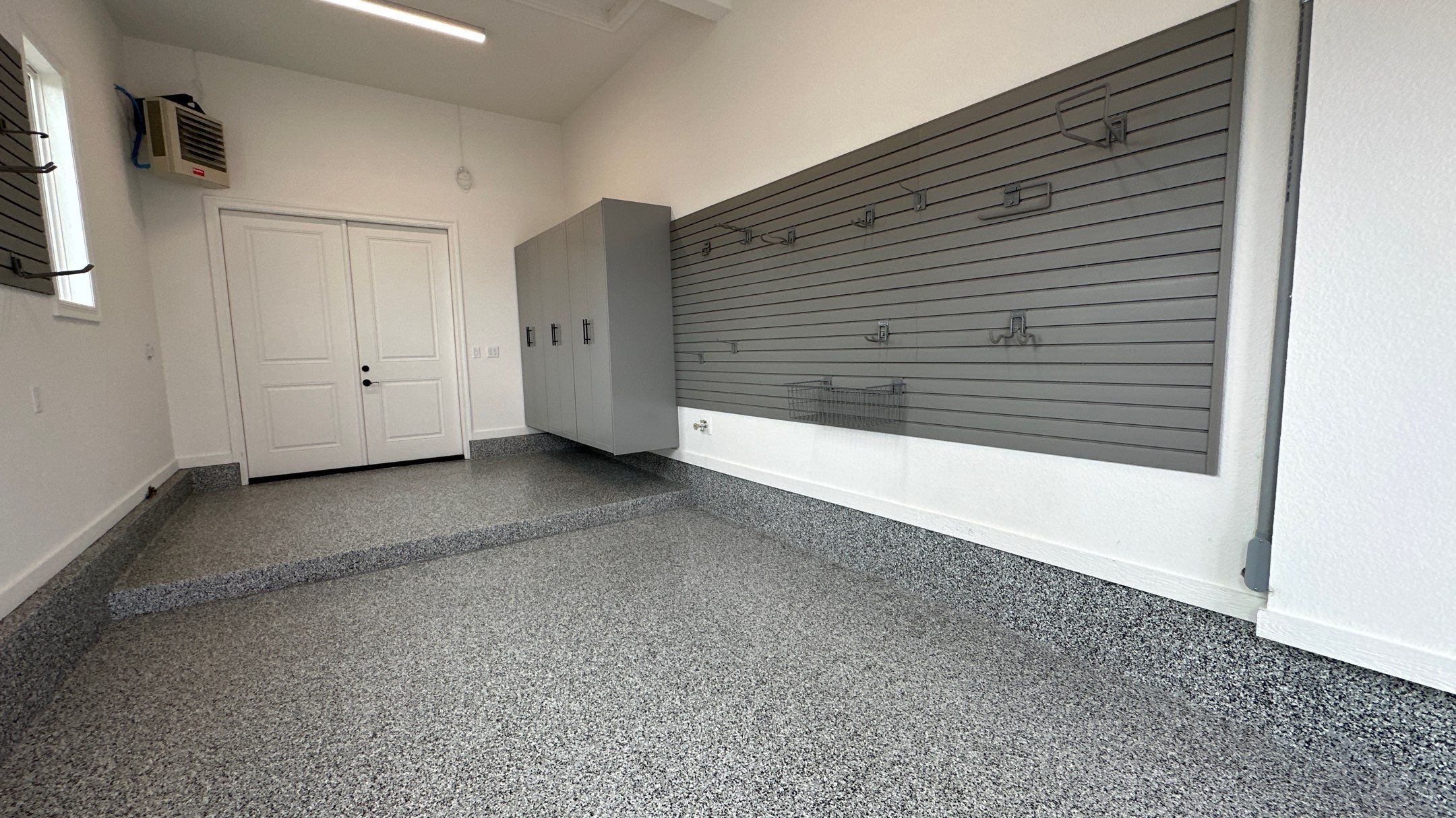 Mike & Pam transformed their garage with a Banner Garage Floor and Cabinets by Banner Garage