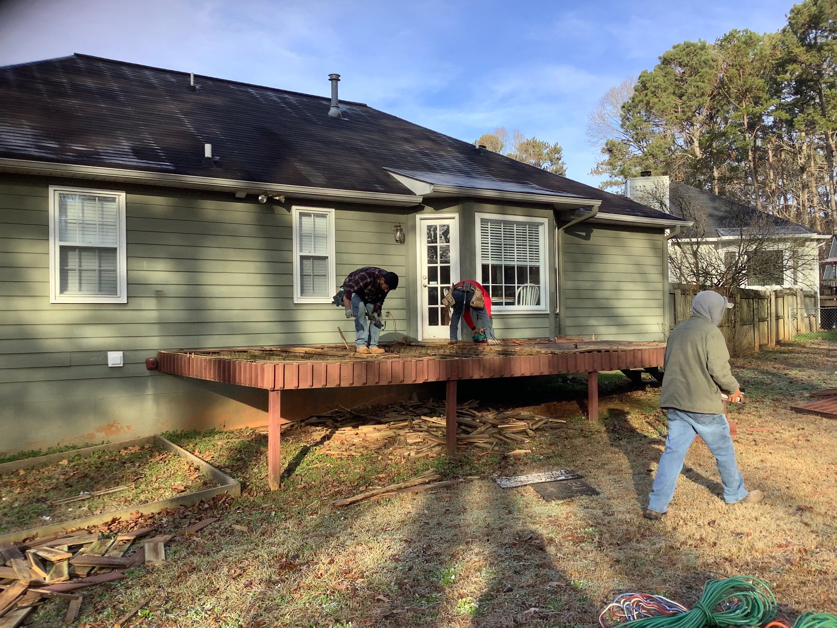 Raised Pressure-Treated Wood Deck Construction in Dallas, Georgia by Swift Home Renovations 