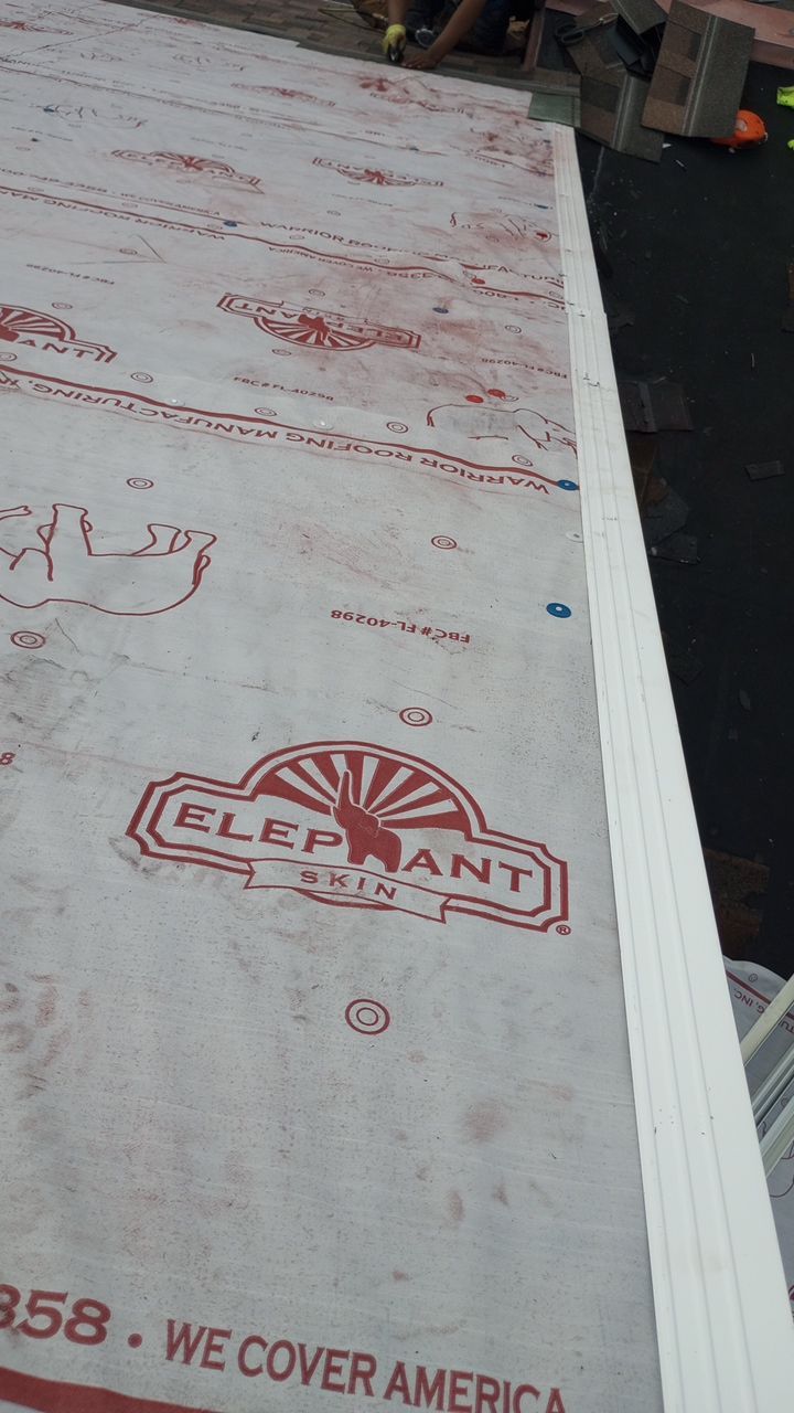 Commercial Roofing Installation using Performance Shingles by Mr. Roofer