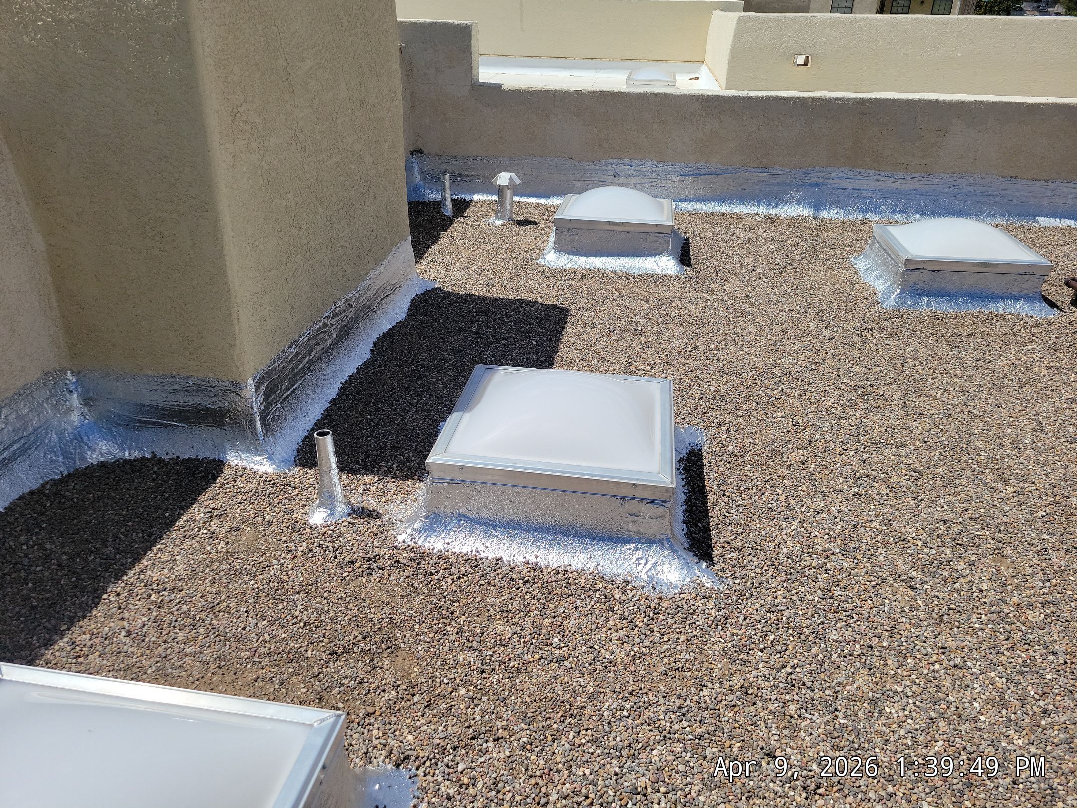 Tar and Gravel Roof Maintenance and Skylight Sealing in Rio Rancho by Doyle Roof Masters Inc