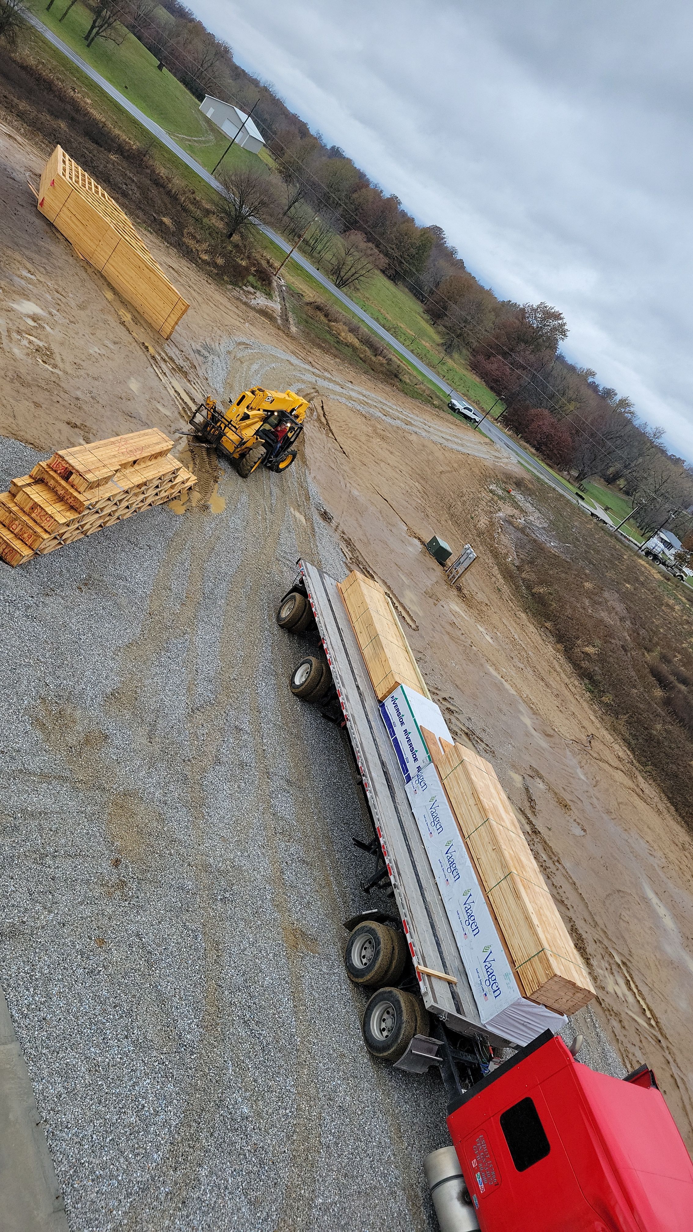 New Home construction w/ board and batten sides and metal roof  by Miles Construction 