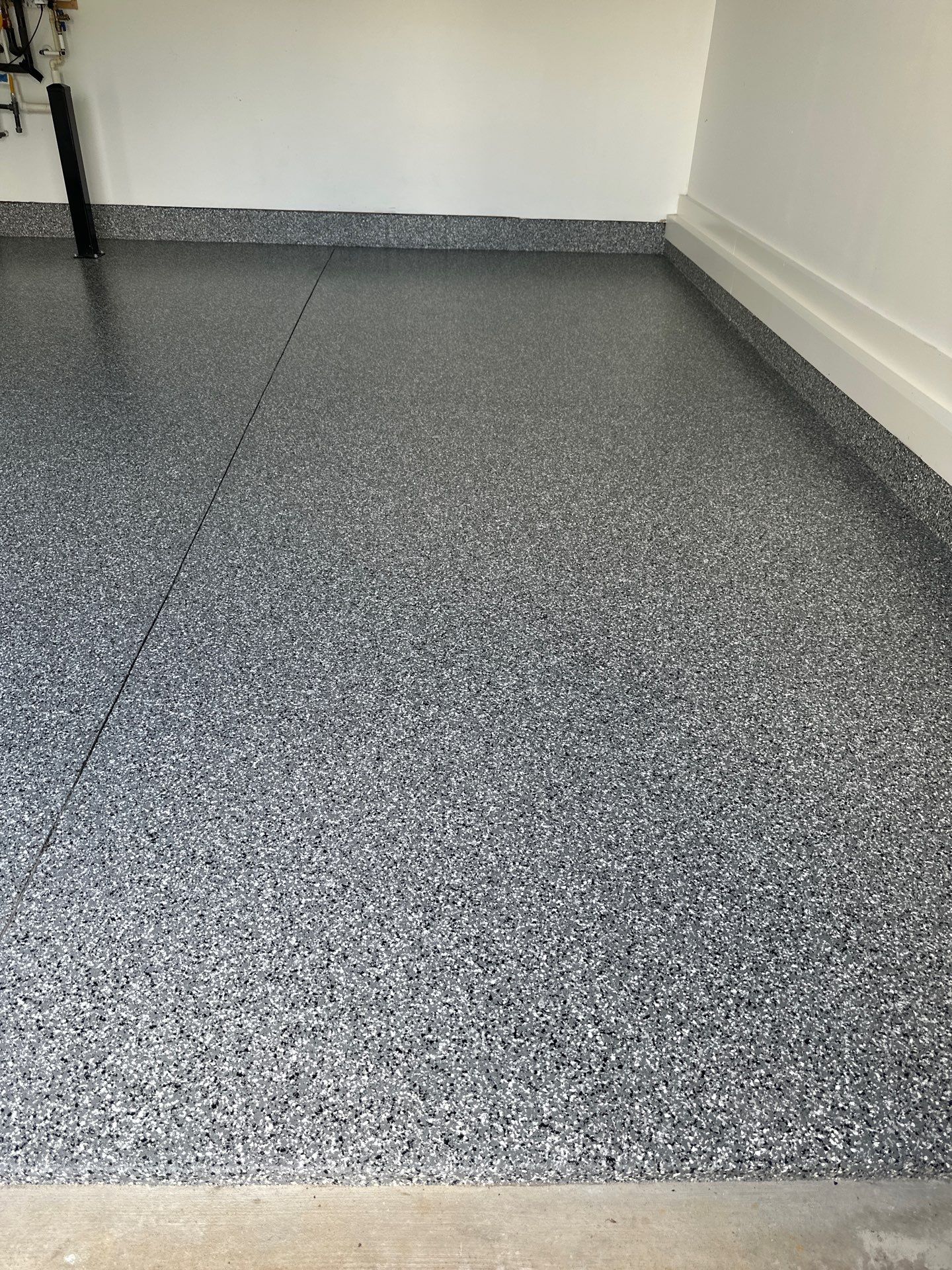 Garage Floor Coating using Wombat by My Garage Floor Guys