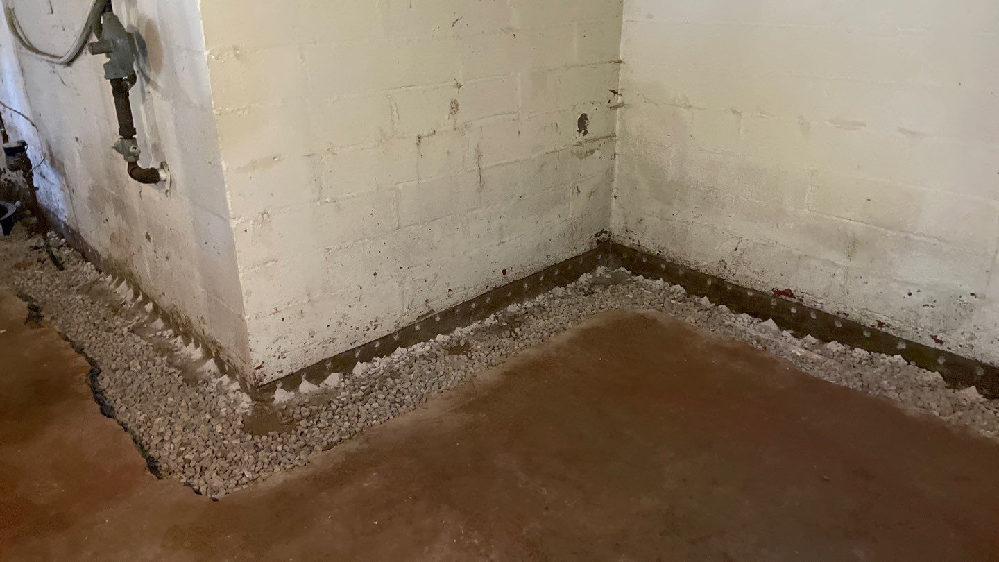 Interior Drain Tile & Sump Pump System in North Minneapolis by Waterproofing Northeast