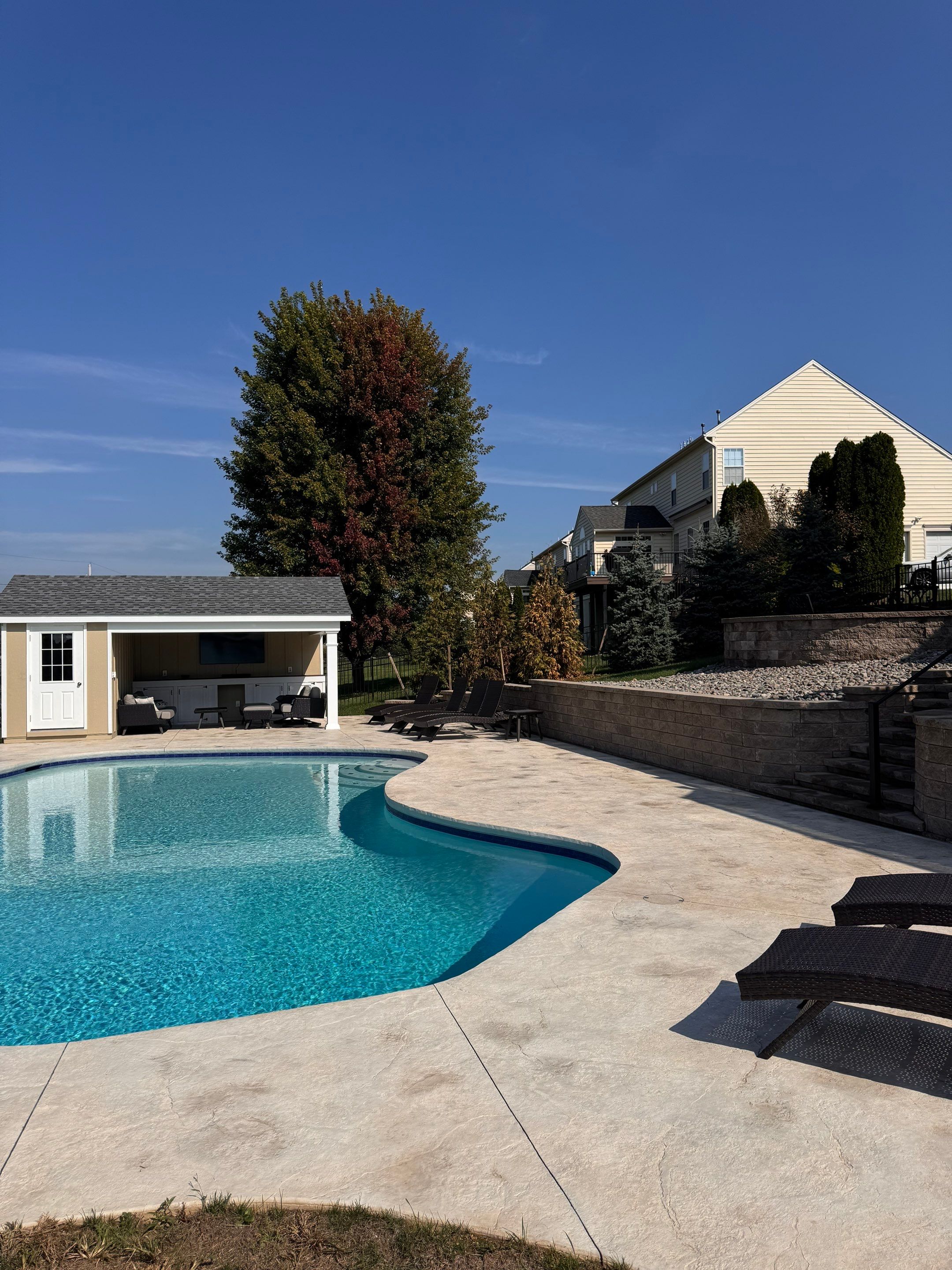 stamped concrete pool deck  by Architectural Concrete Design