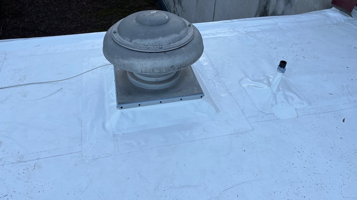 Residential ReRoofing Installation using Durolast by Top Notch Roofing Inc