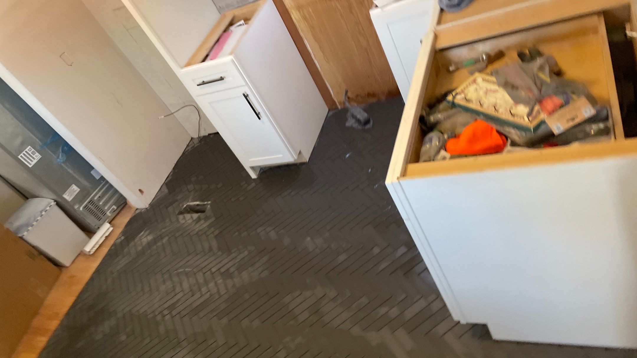 Kitchen Backsplash and Herringbone Tile Floor Remodel by Footprints Floors of Coastal Carolina