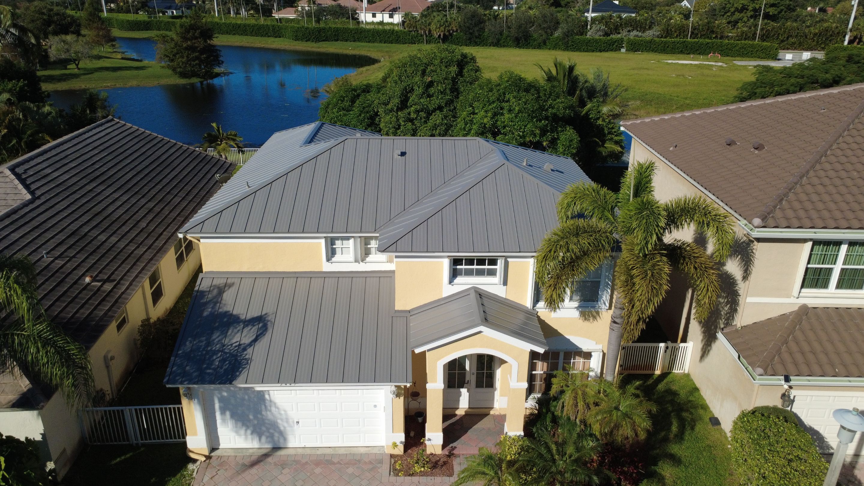 Residential Roofing Installation using 1" Nail strip metal roof by BLUES BROTHERS CONSTRUCTION CORP