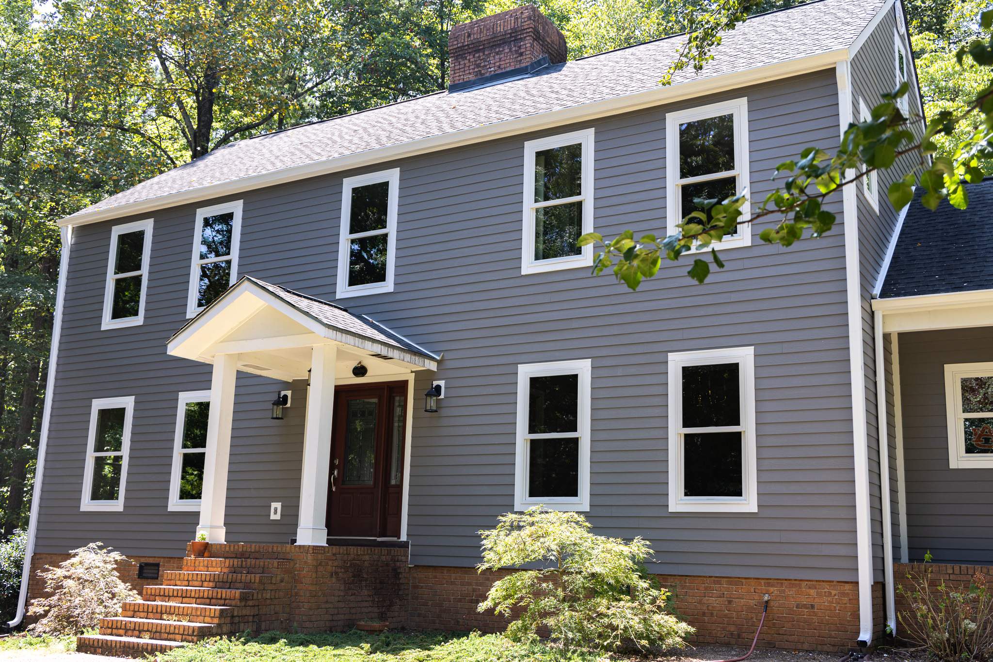 Aged Pewter Hardie + Windows by Freedom Exteriors