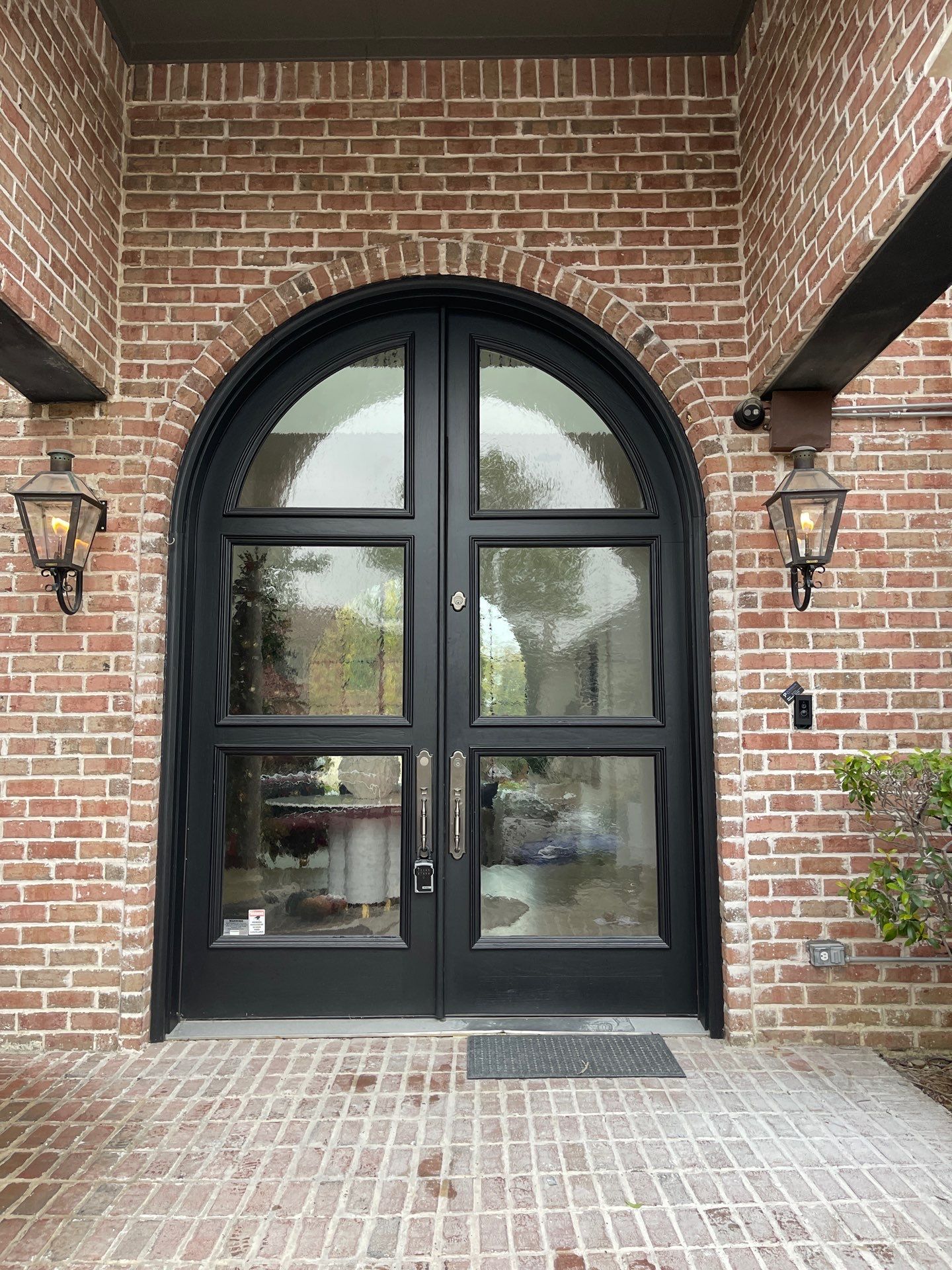Custom Arched Metal Entry Door Installation in Plano by Solara Custom Living