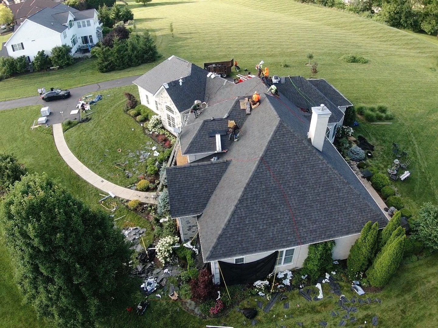Residential Roofing Installation using Atlas Pinnacle Black Shingles by 614 Exteriors
