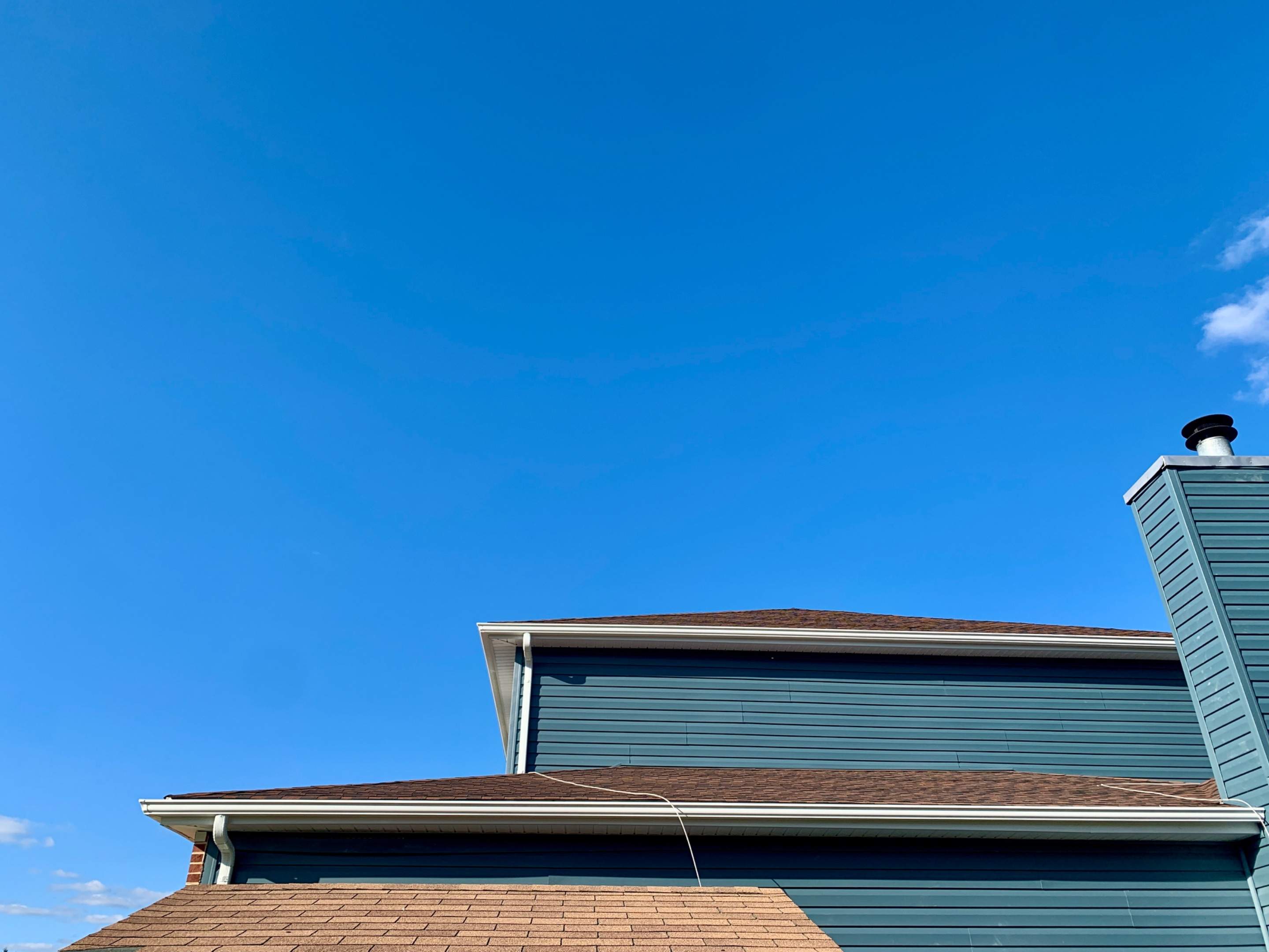 Gutter Installation using 5" Seamless Gutters by Matter Roofing & Construction