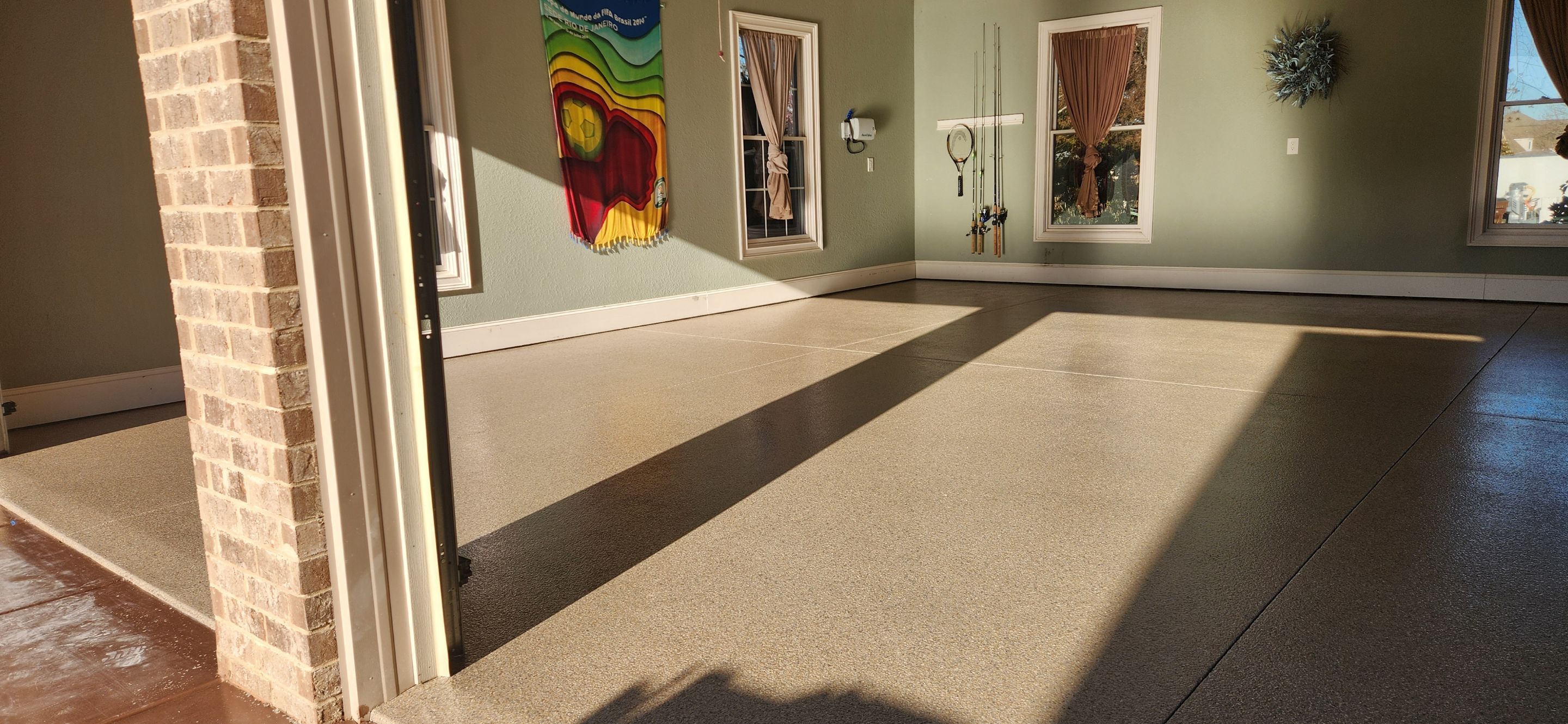 Garage & Back Patio Upgrade with Obsidian & Garnet by Elite Floor Solutions