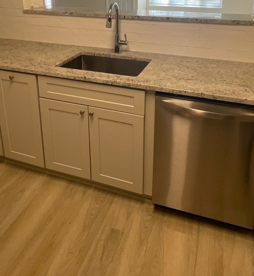 Home Remodel using LVP Flooring and Cabinets by HandyMangum
