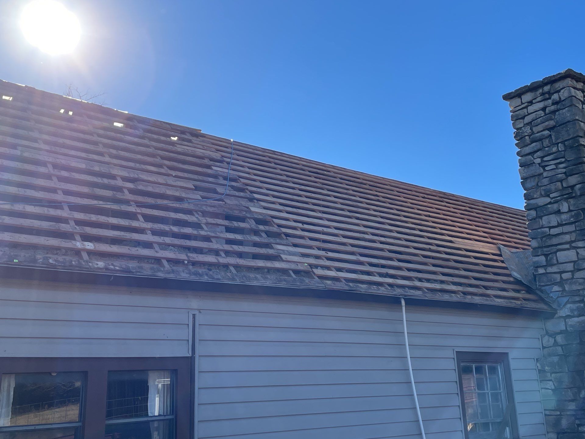 Residential Roofing Installation using ATLAS Pinnacle Pristine Shingles by Harvey Roofing & Construction