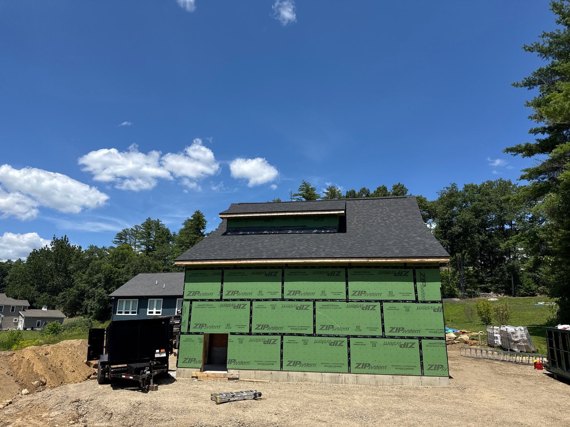 Merrimack NH ADU Roof Installation with Owens Corning Onyx Black Shingles and Standing Seam Metal Accents by Compass exteriors