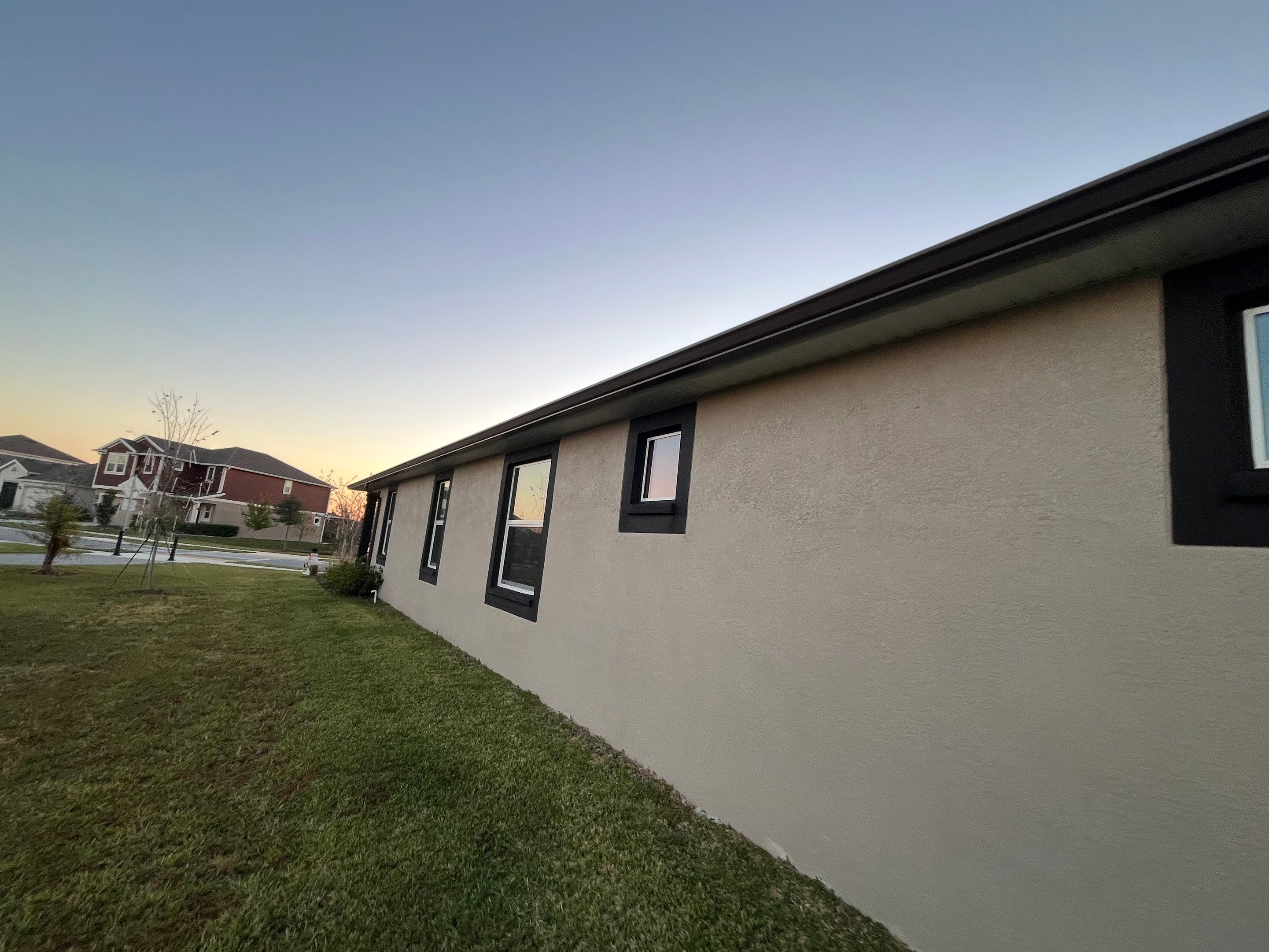 3X4 elbow Downspouts using Musket Brown Seamless Gutters in Lakeland FL by Gutter Professors