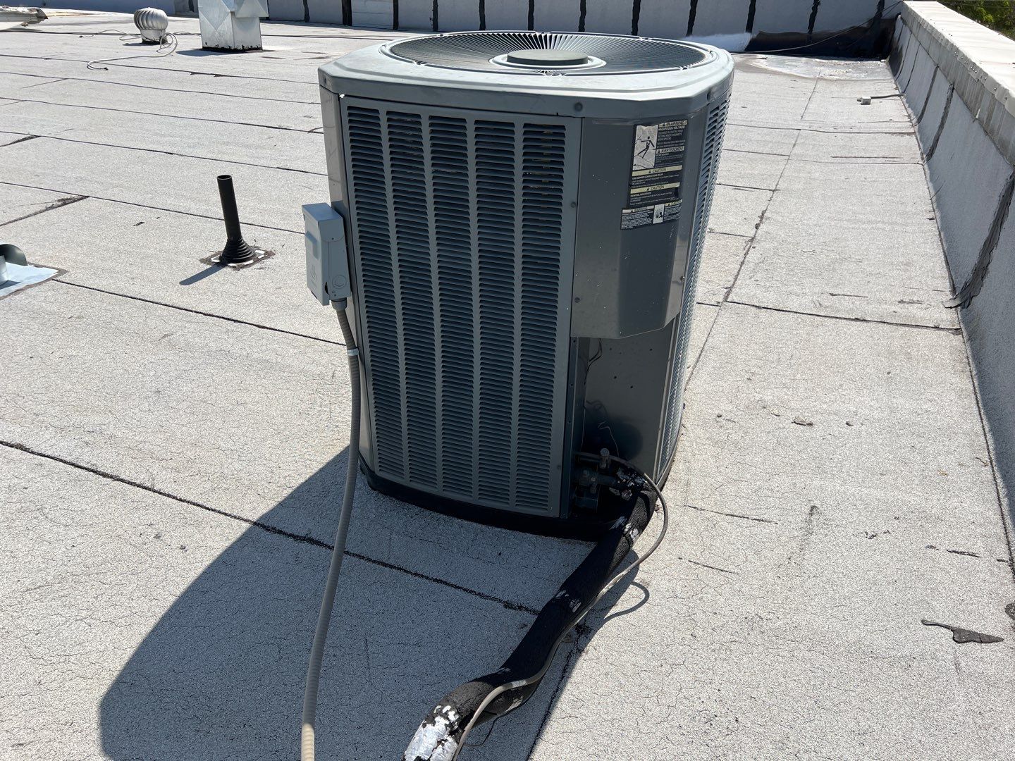 Spray foam and coatings using Conklin Benchmark/PUMA XL coatings and spray foam by Straight Edge Roofing Inc