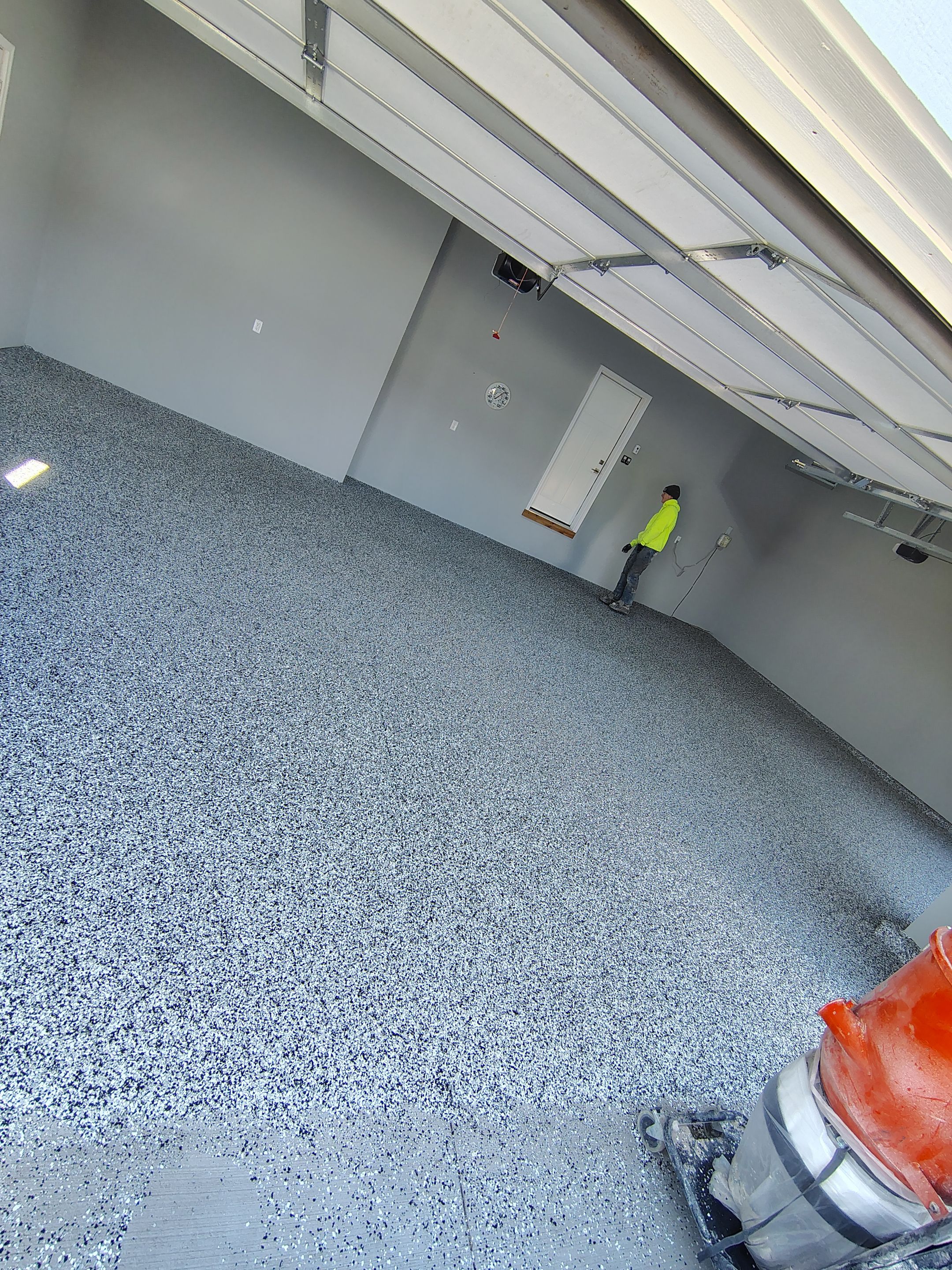 Sioux Falls Garage Floor with Domino Flake by Select Painting, Coatings & Garage Cabinets