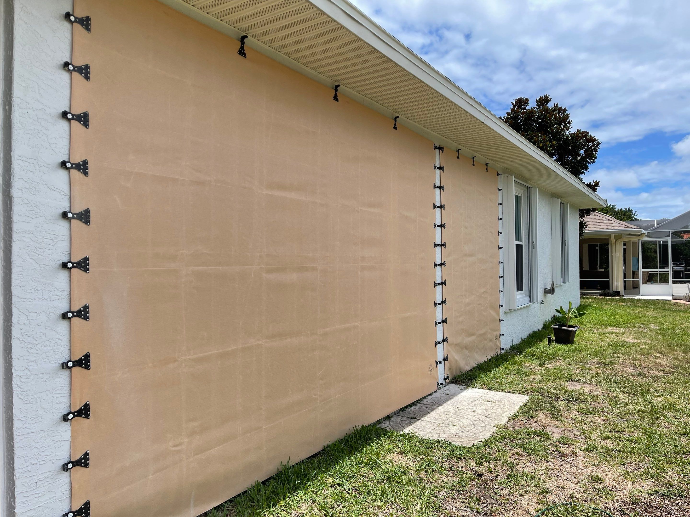 Hurricane Fabric and Accordion Shutters by Smart Guard Shutters