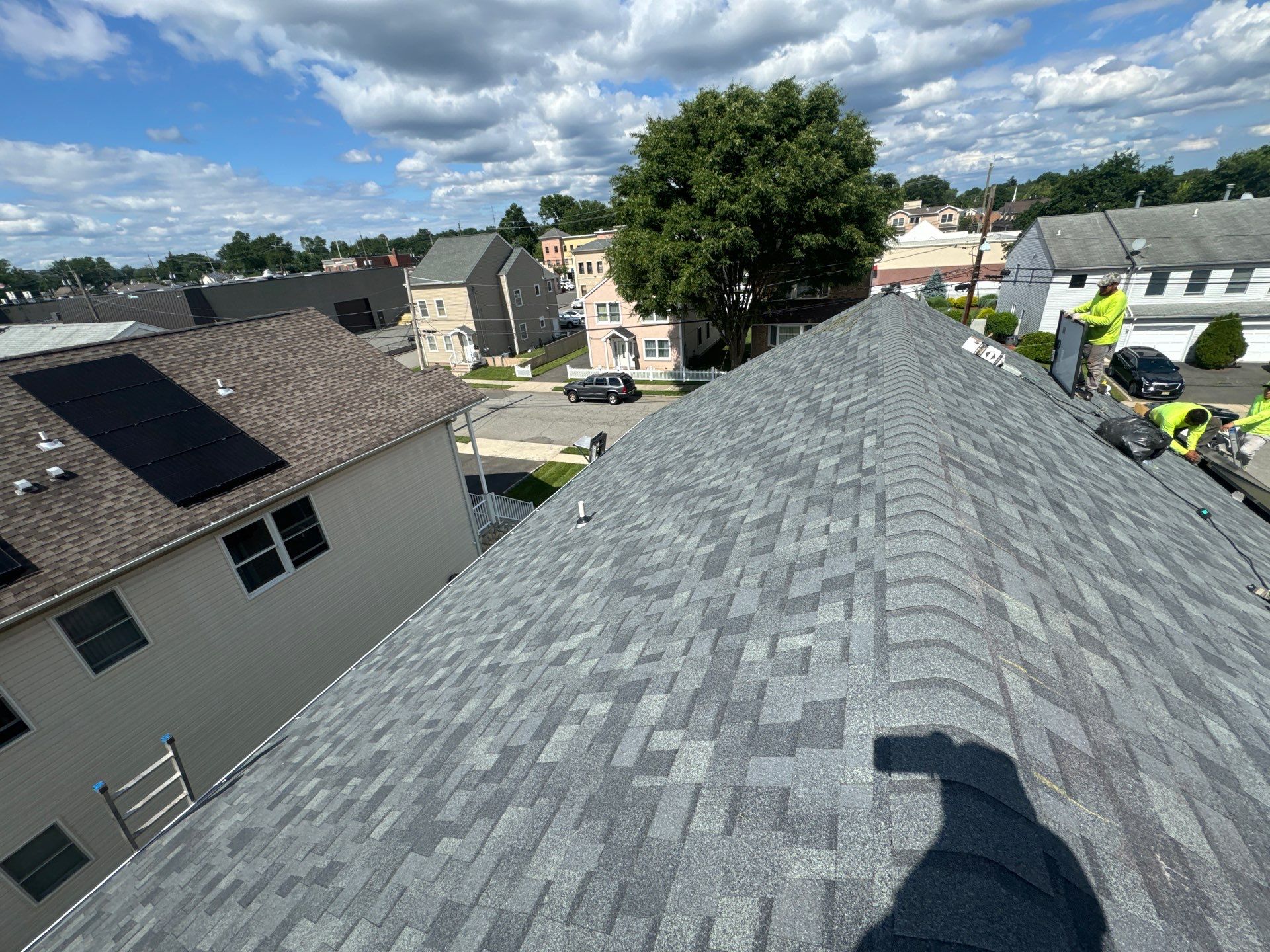 Charcoal Shingles by Reimagine Roofing