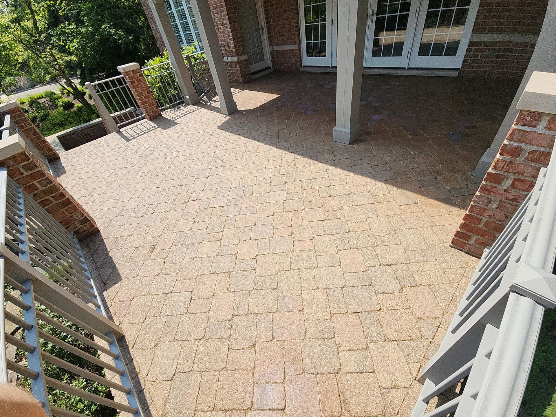 Brick paver cleaning sanding and sealing by Northern Power Washing LLC.