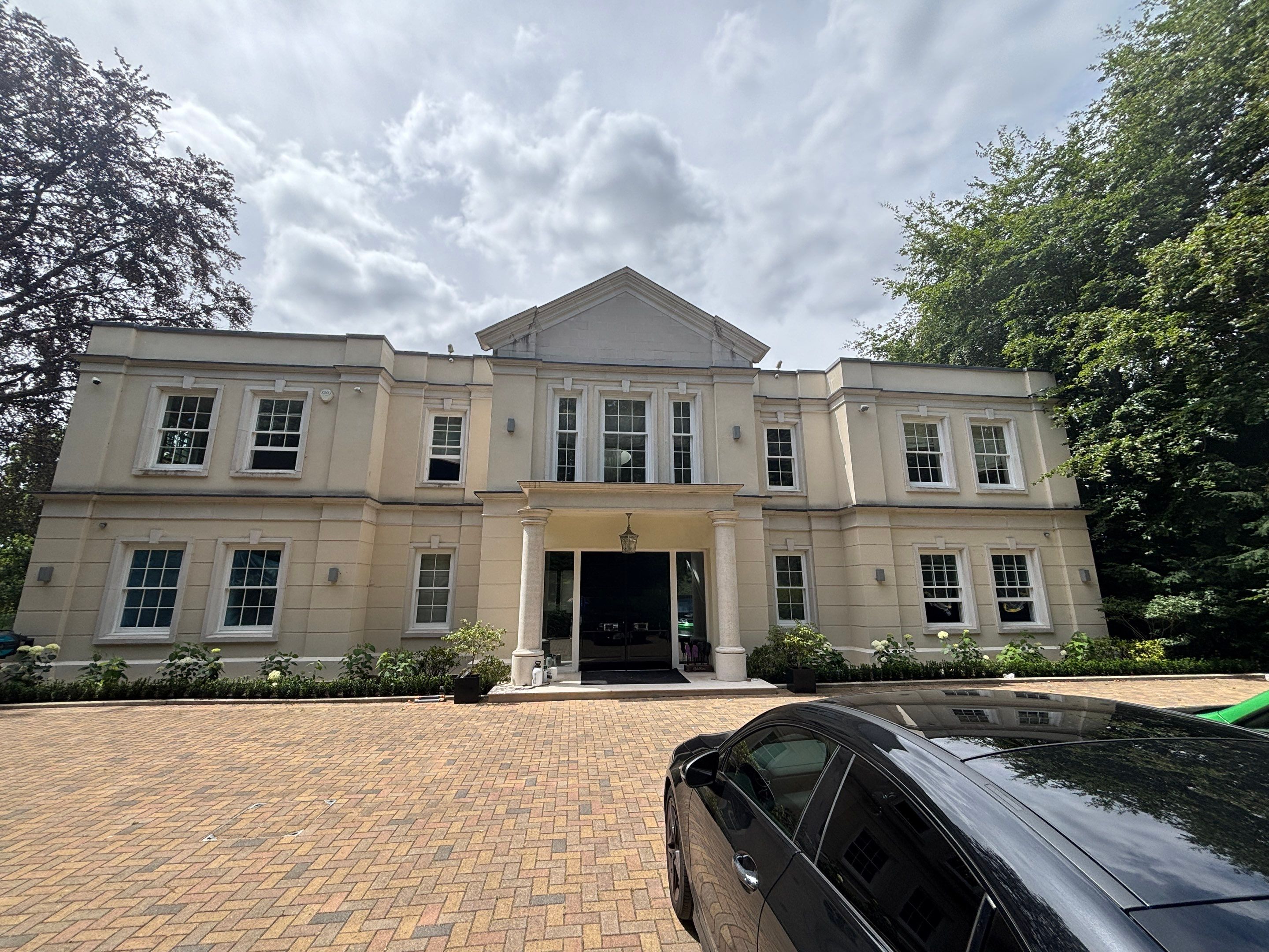 Full Exterior Cleaning of a Neoclassical Estate in Weybridge by Ges Exterior Cleaning ltd