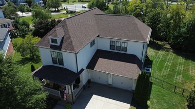 Architectural Asphalt Shingle Roof Replacement and Downspout Installation in Franklin