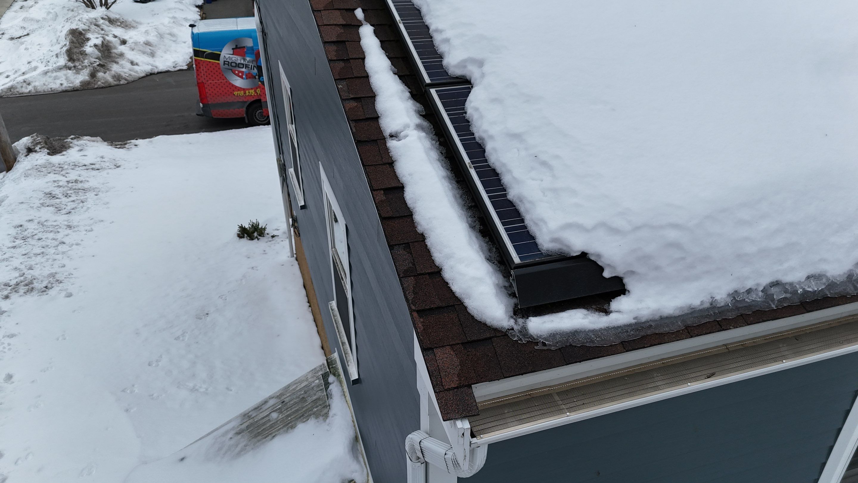 Ice Dam Removal & Snow Removal in Woburn, MA by Mighty Dog Roofing of Greater Middlesex County