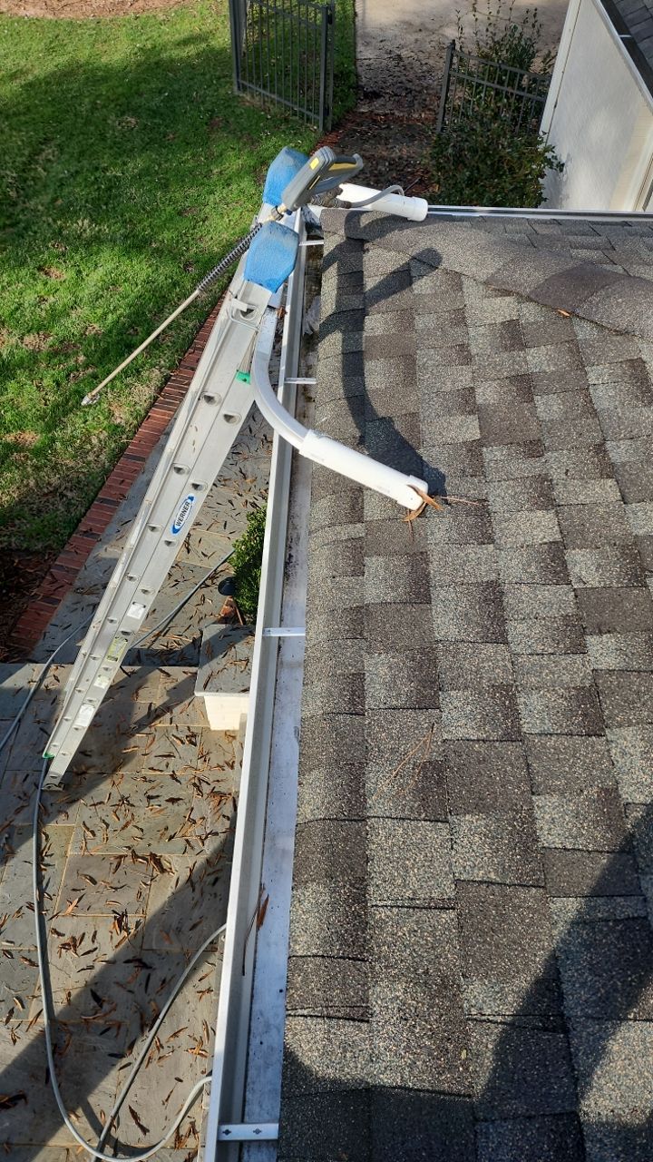 Gutter Cleaning using water by Power Wash Masters LLC
